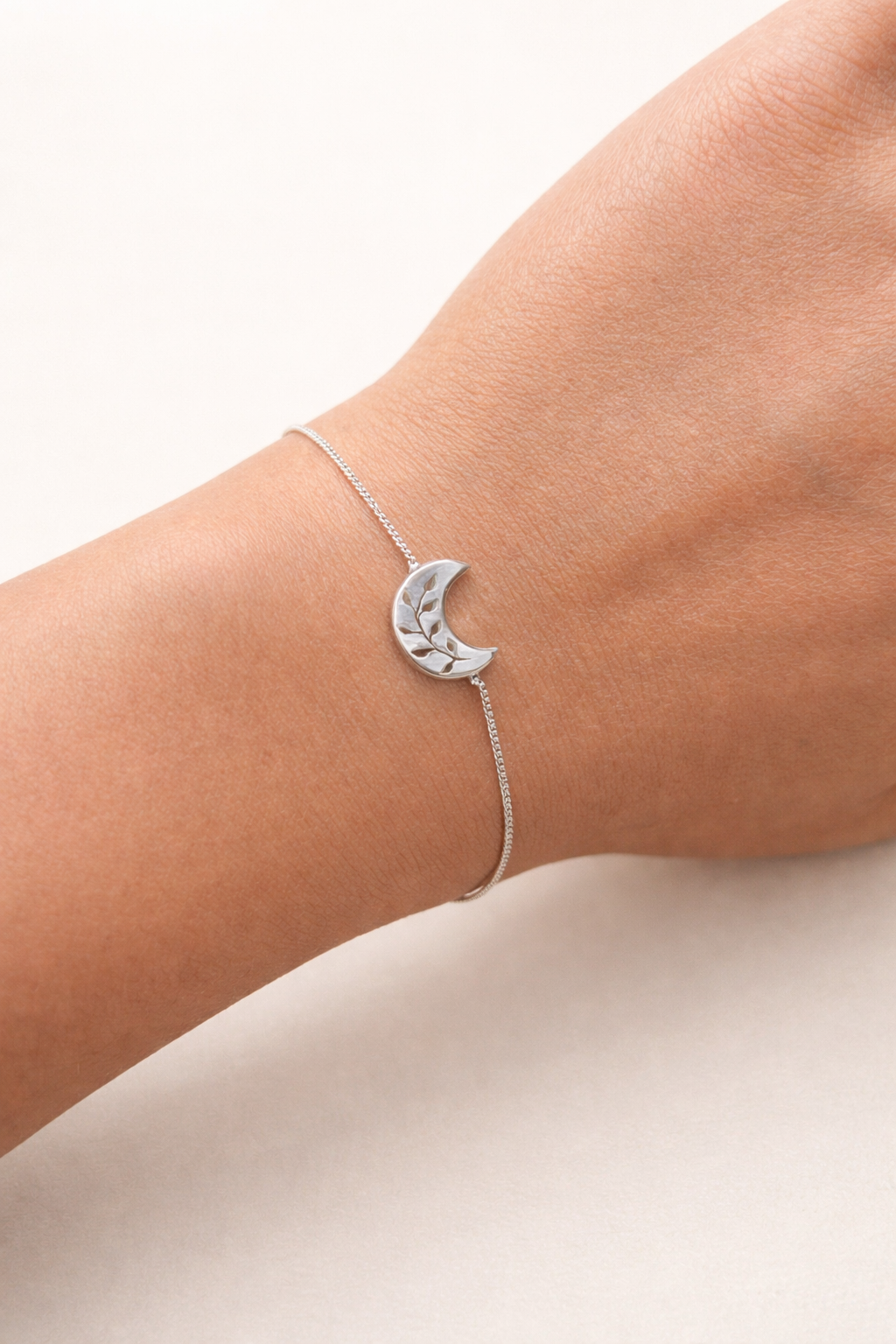 Flora-Crecsent-Bracelet-Hand.PNG