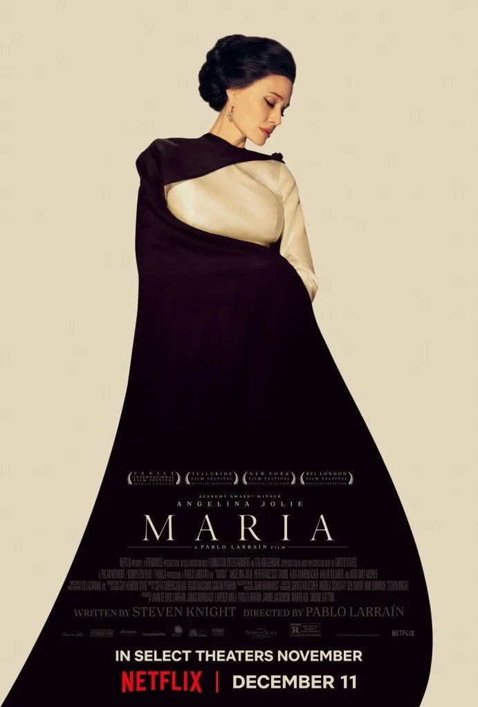 Movie poster for "Maria" featuring actress Angelina Jolie with her eyes closed, wearing an elegant black and cream dress, standing against a plain background.