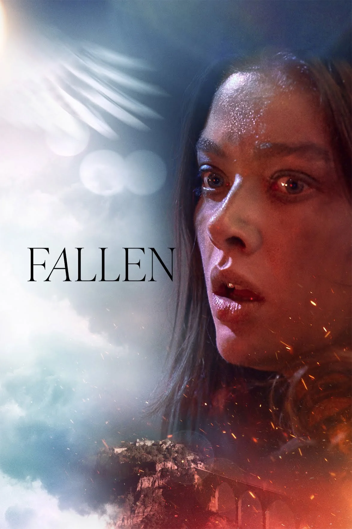 Poster for the movie 'Fallen' featuring a woman's face with a serious expression, a cloudy sky in the background, and a landscape with a bridge at the bottom.