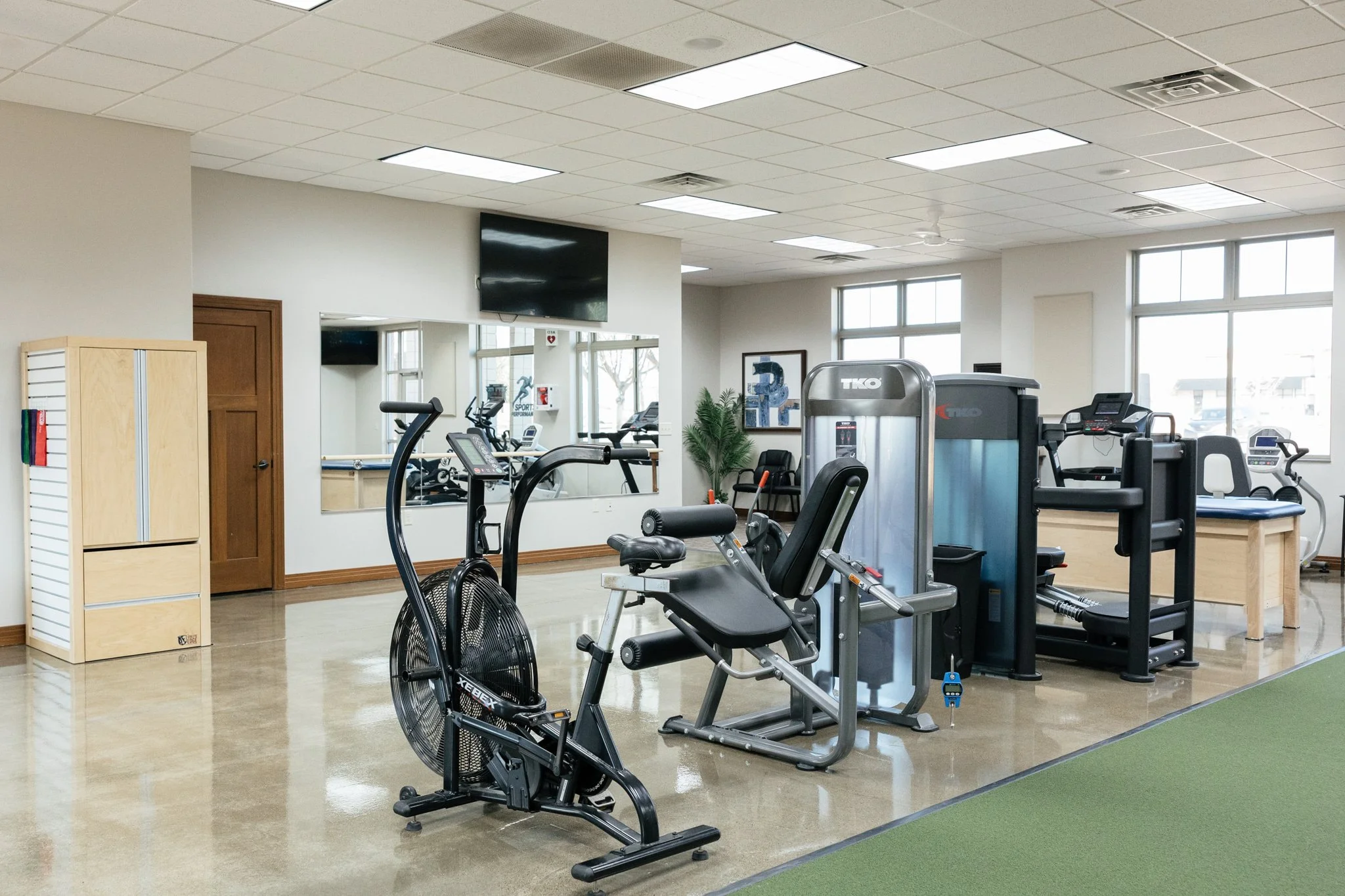 Dynamic Life PT Clinic, open space with Physical Therapy Equipment