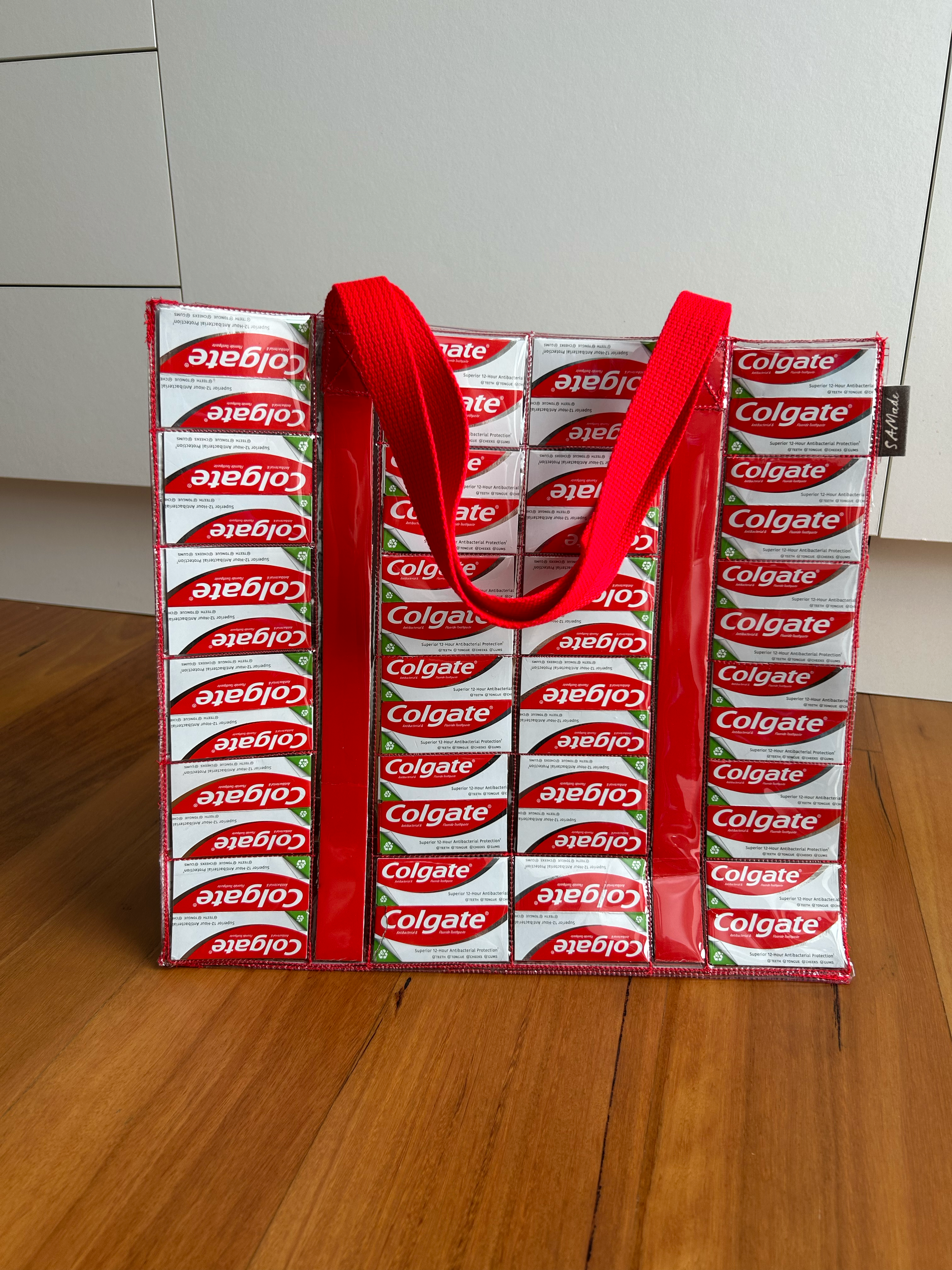Colgate Couture, SAMade tote bag, upcycled toothpaste packaging.