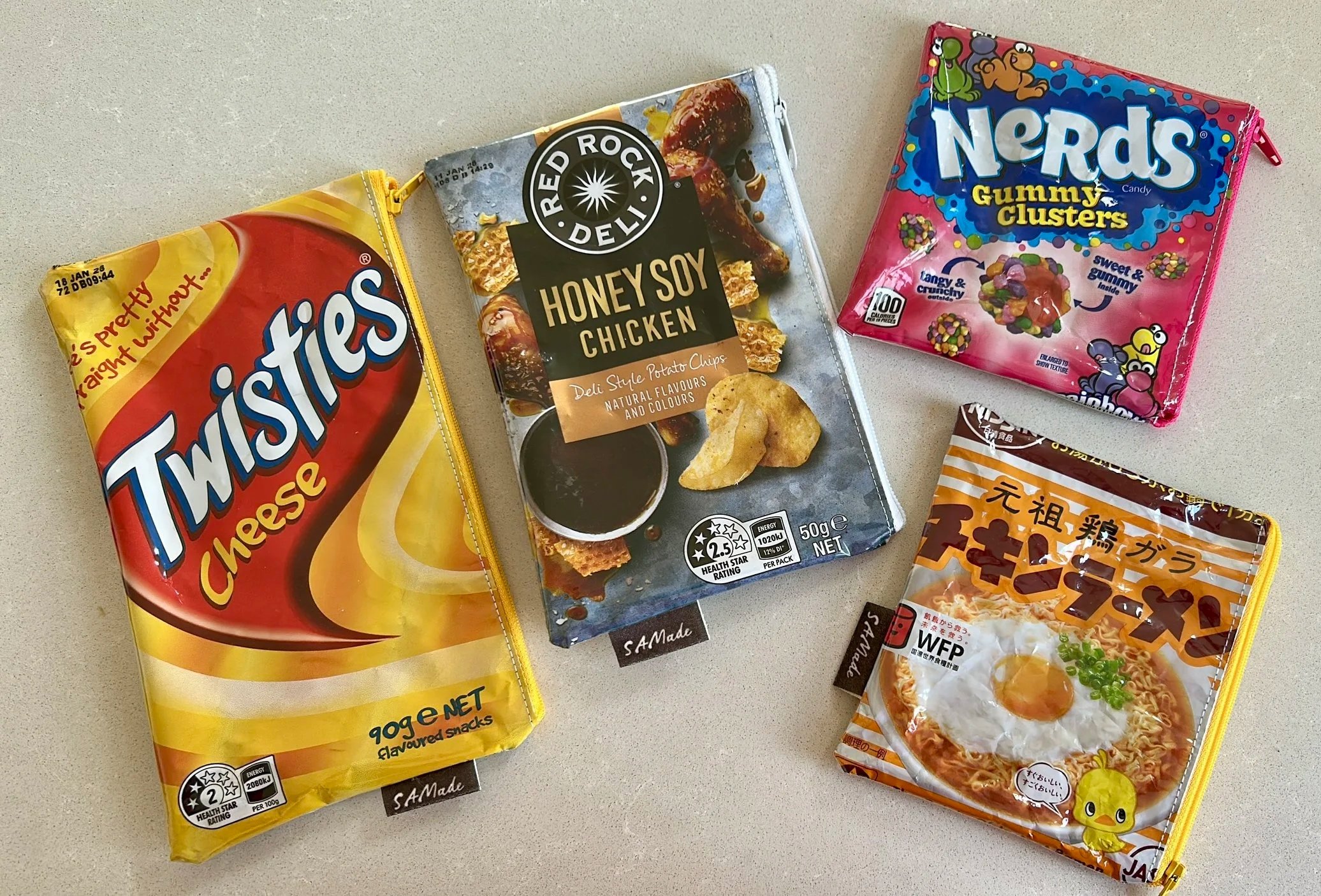 Packet purses, food packaging and remnant fabric.