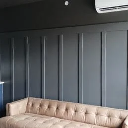Anthony's Painting and Paperhanging blue wall with couch (1).jpg