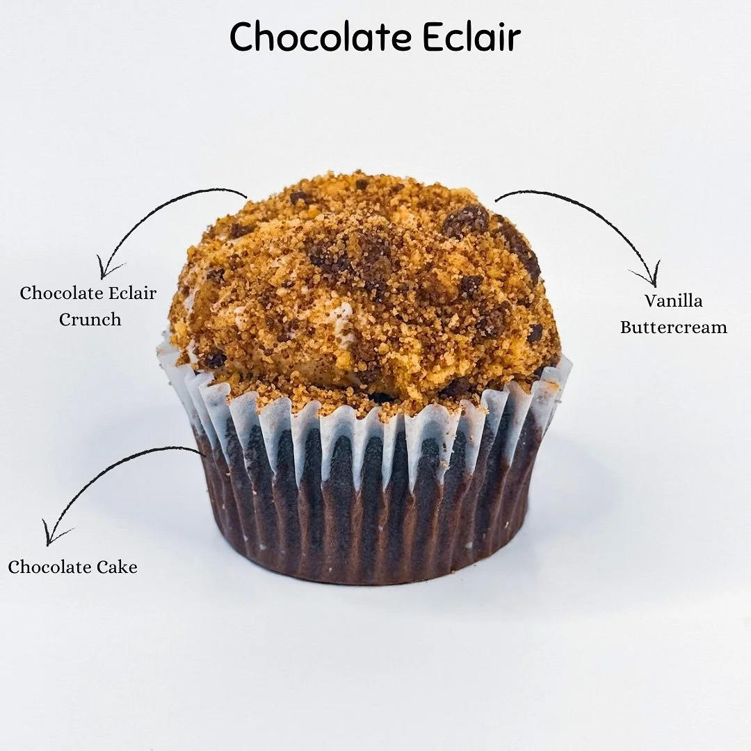 Indulge in our Chocolate &Eacute;clair Cupcake: a decadent chocolate cake topped with creamy vanilla buttercream and finished with a chocolate &eacute;clair crunch! 🍫✨ A bite-sized piece of heaven. Who&rsquo;s ready to try one? 😍 #ChocolateEclair #