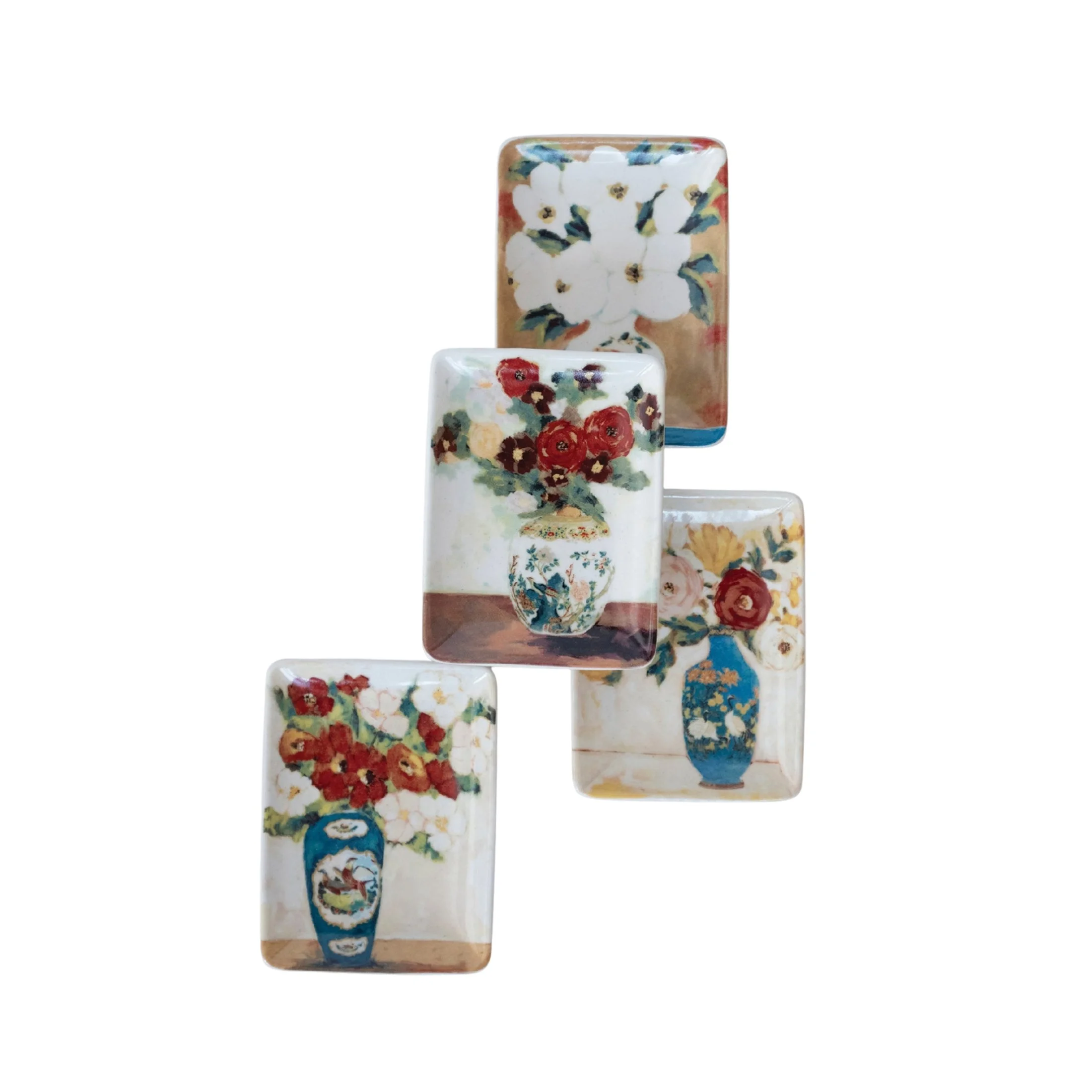 Assorted floral vase stoneware trinket dishes displayed together