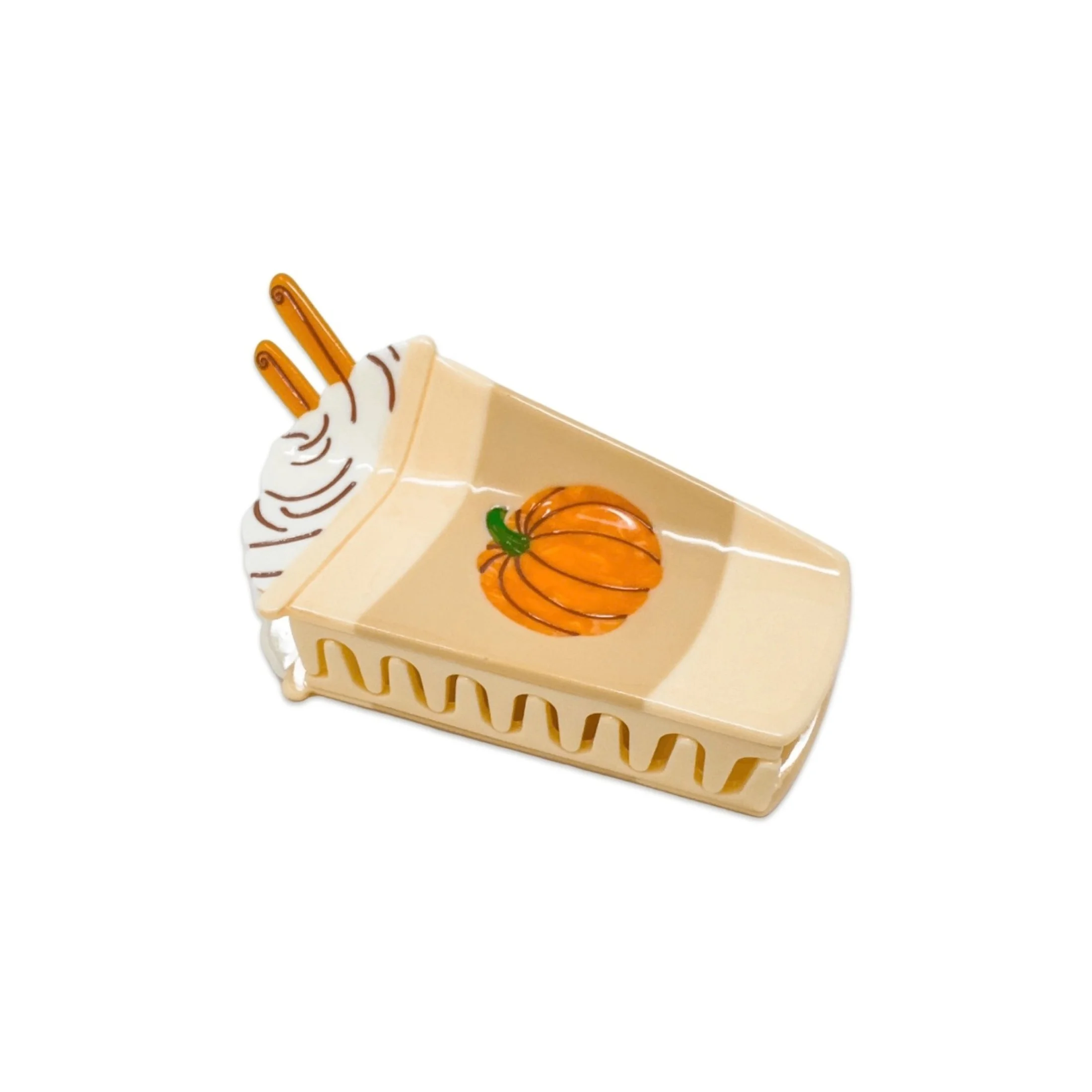 Side view of pumpkin spice latte hair claw with orange pumpkin and whipped cream detail