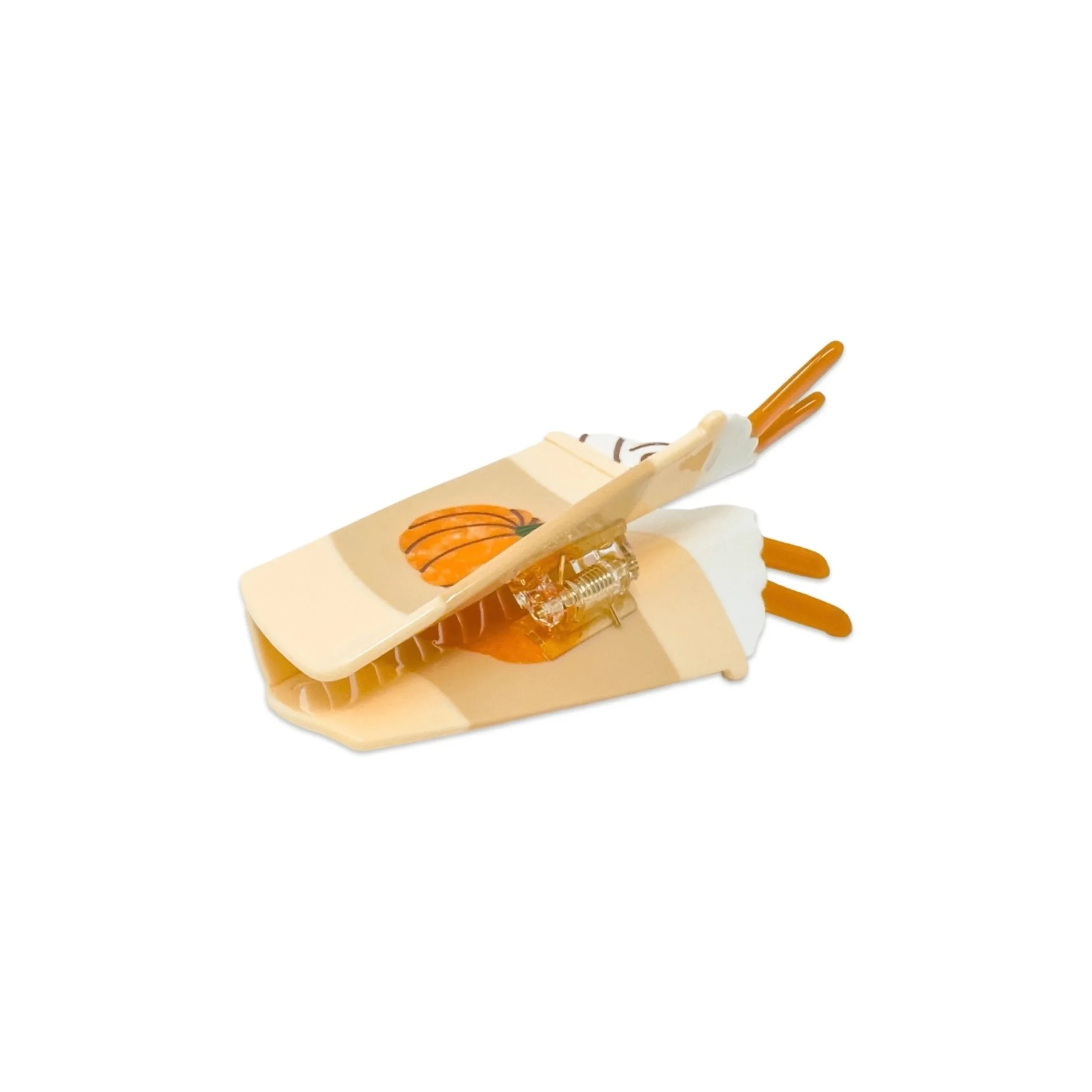 Open pumpkin spice latte hair claw showing teeth and spring closure