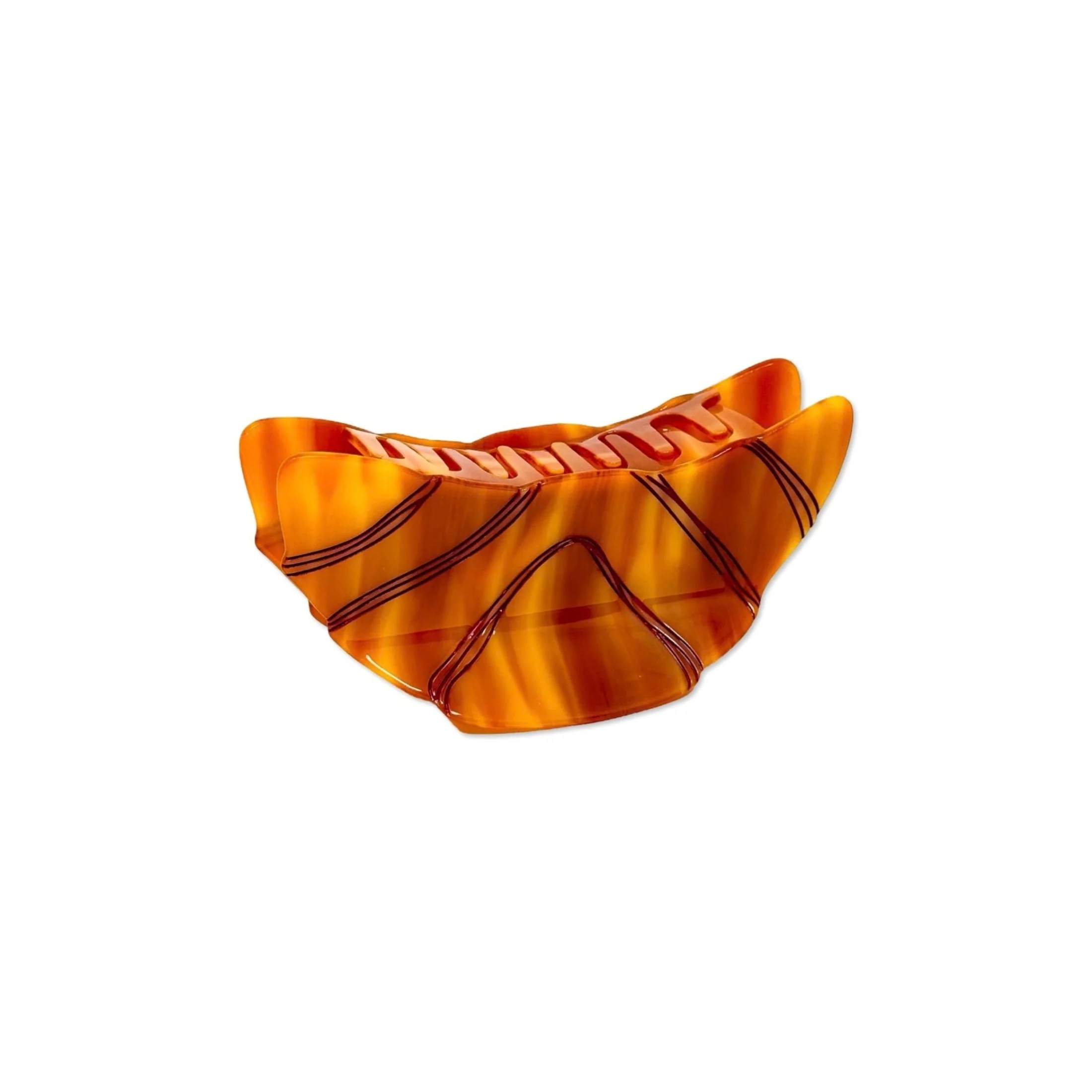 Back view of XL croissant hair claw showing curved pastry shape and claw teeth