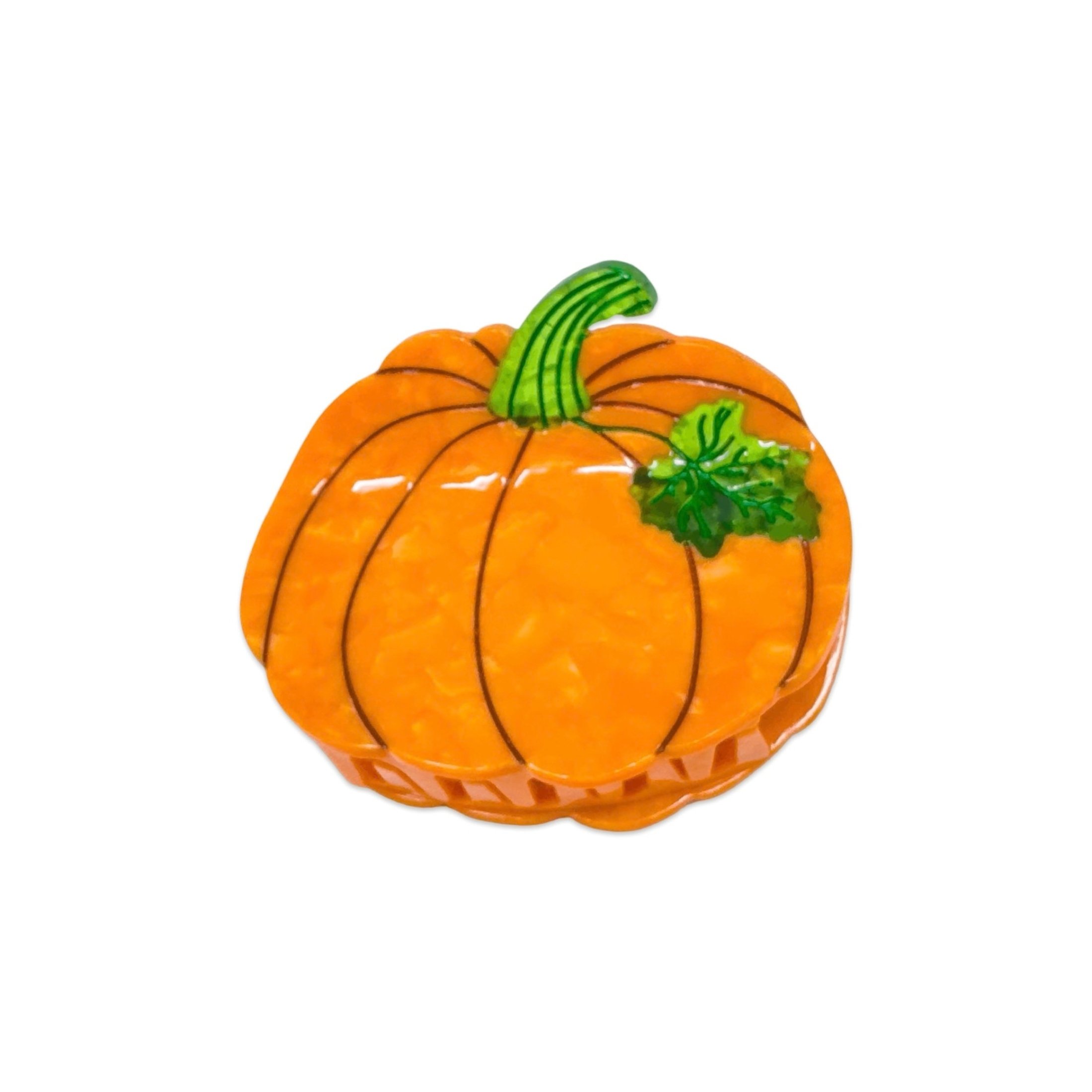 Orange pumpkin hair claw clip by Jenny Lemons with green stem and leaf detail