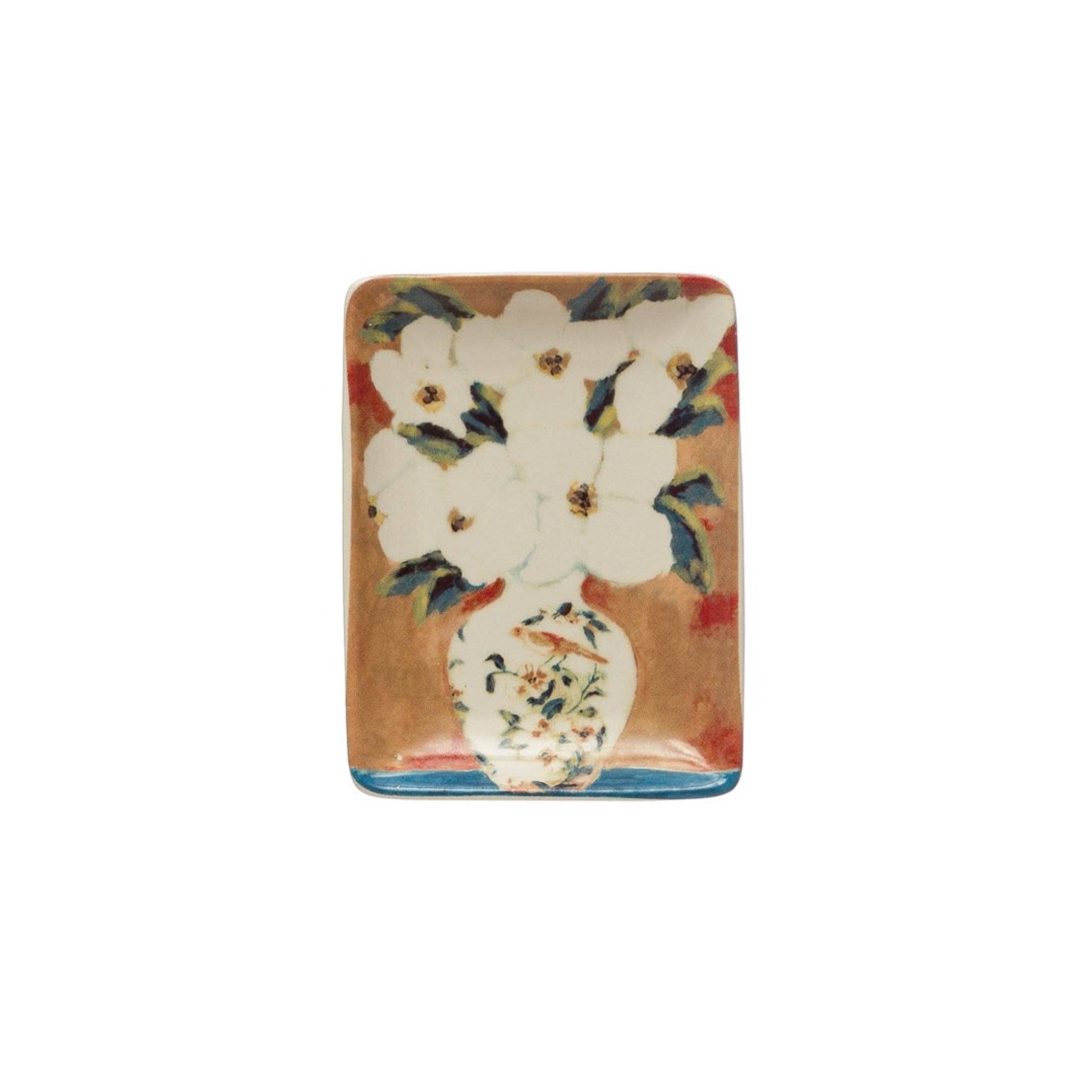Stoneware trinket dish with white flowers in a decorative bird vase