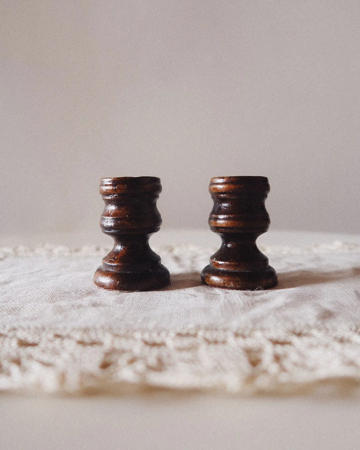 thegarage_pair_turned_wood_candlesticks_front.jpg