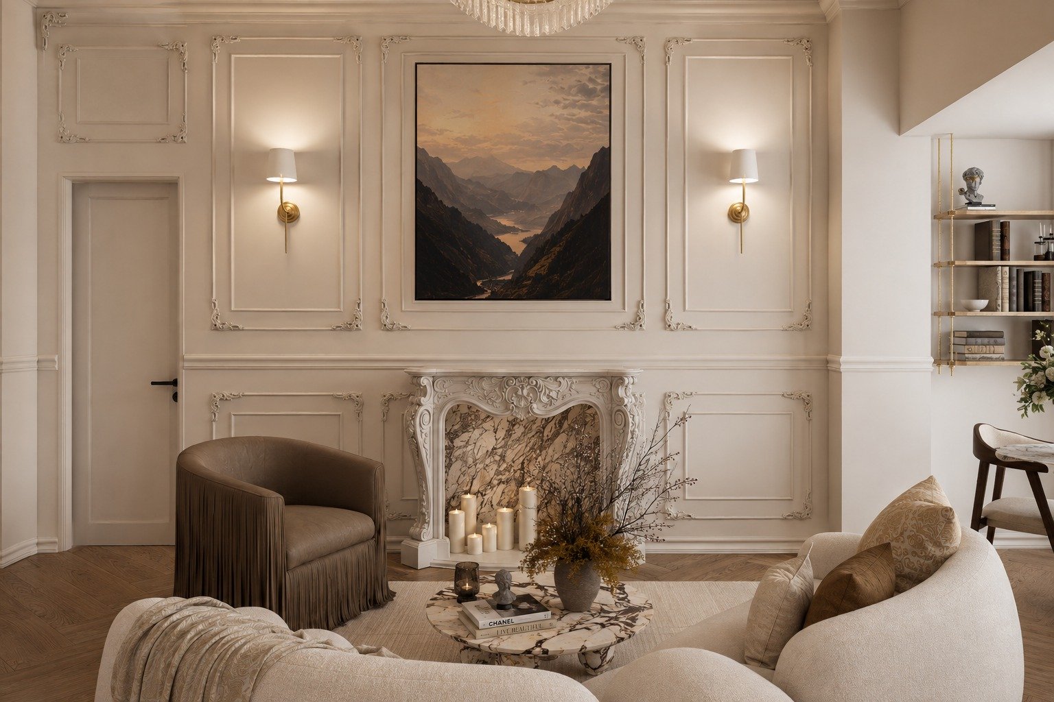 Elegant living room with a white ornate fireplace, candles, and a large landscape painting above it. Two wall sconces with white shades flank the painting. A marble-topped coffee table with a vase of branches and candles is surrounded by beige and br