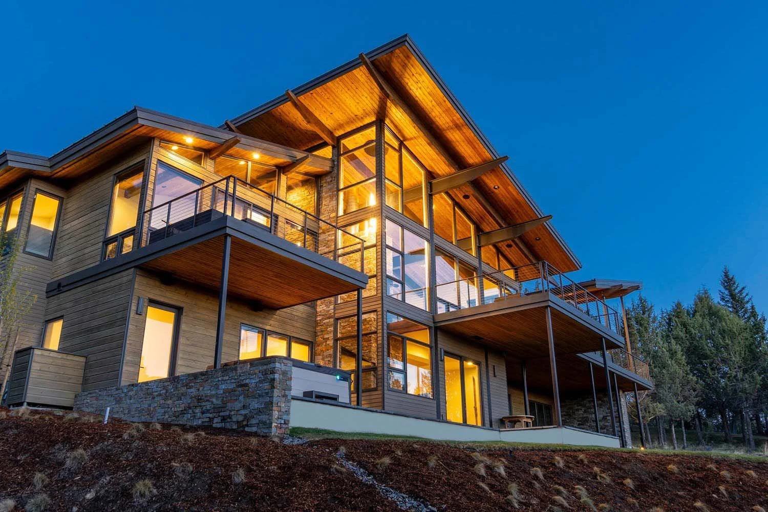 This stunning multi-story luxury custom home in Awbrey Butte - Starview is a testament to sophisticated architecture and exceptional construction. Designed by Spencer Williams and built by Pacwest Builders, a leading home builder and contractor in Ce