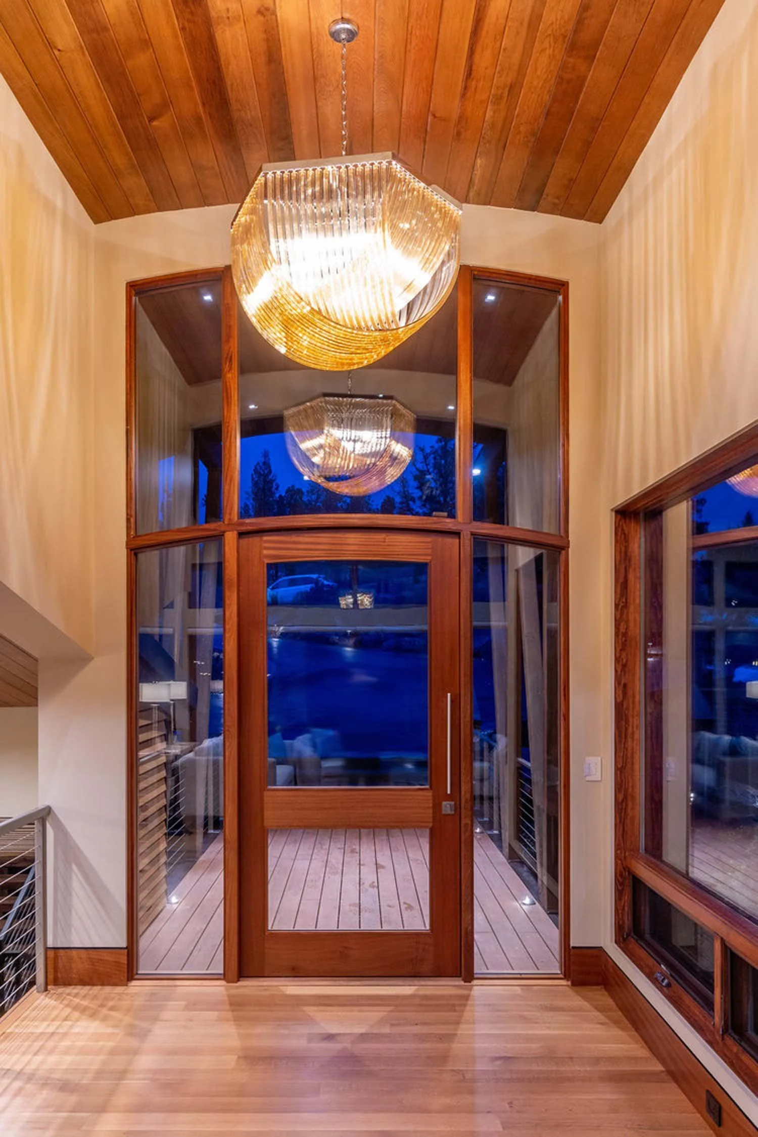 As experienced builders of luxury custom homes in Central Oregon, Pacwest Builders masterfully crafted this unique residence at North Rim - Wild Rye. This image highlights the home’s striking architecture, including a beautiful wooden ceiling and war