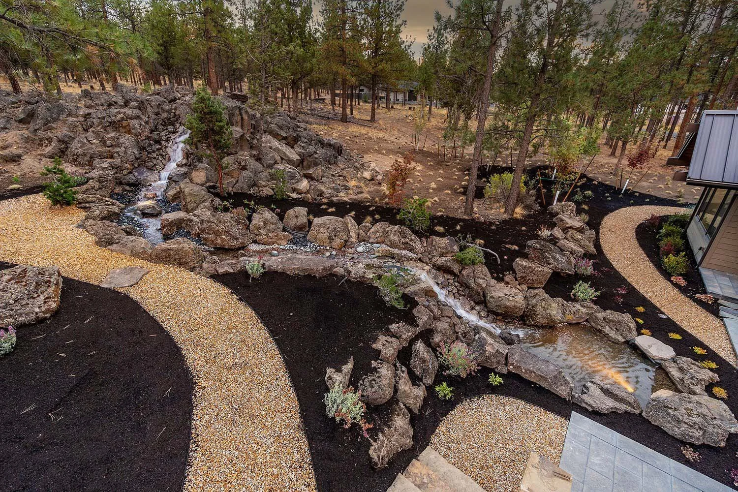 As experienced builders of luxury custom homes in Central Oregon, Pacwest Builders masterfully designed this unique outdoor space at Skyline Ranch - Imbler. The custom landscaping by Earth Designs Landscaping highlights the home's dedication to its e