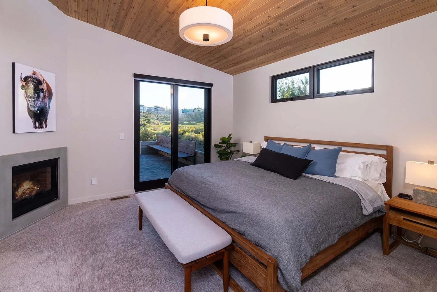 As experienced builders of luxury custom homes in Central Oregon, Pacwest Builders crafted this unique bedroom at Tetherow - Hardin Martin Court. The space, with interiors by Kate Dardin, is designed to take full advantage of its beautiful surroundin