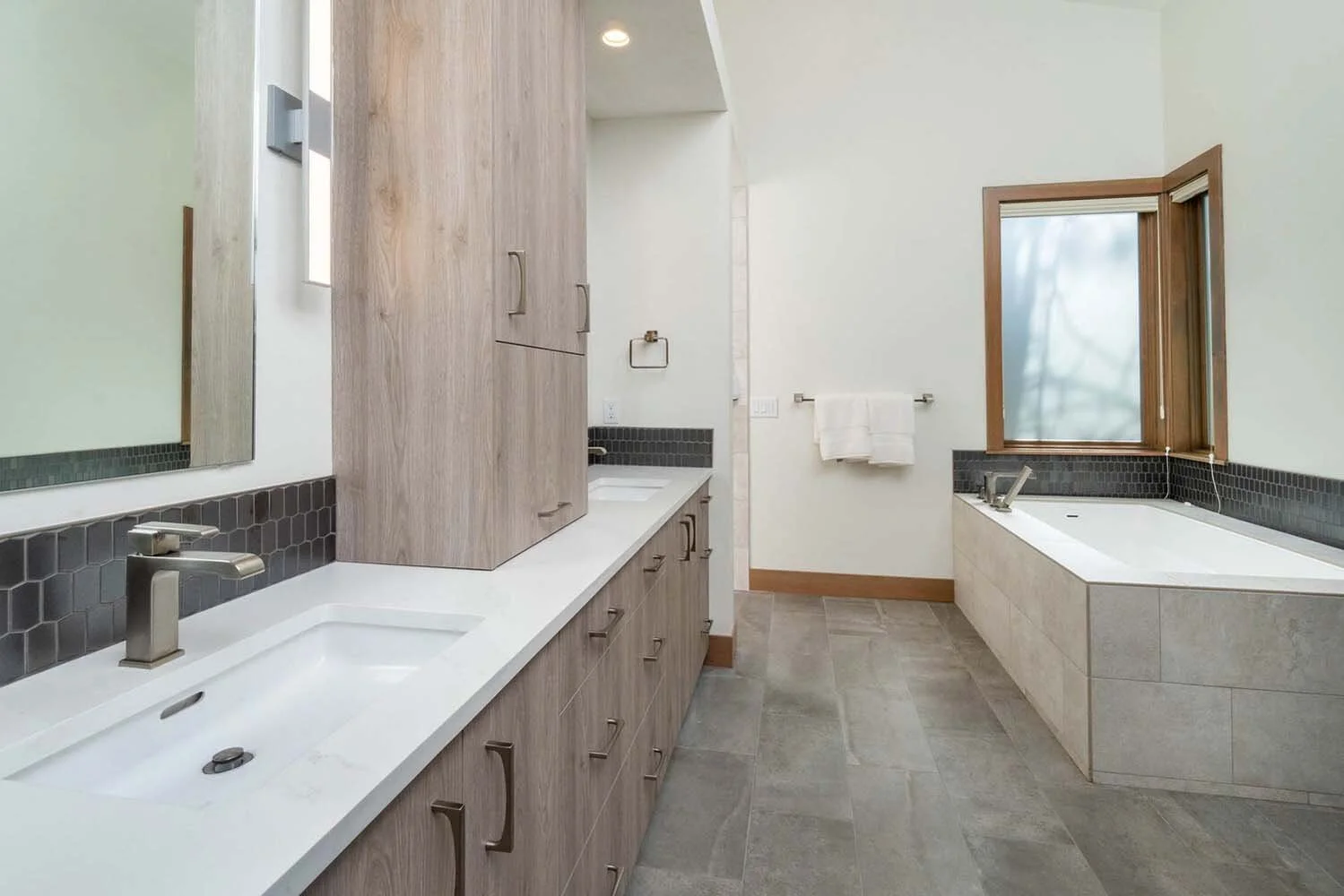 Pacwest Builders masterfully designed this stunning modern luxury custom home in Central Oregon, at Tetherow - Meeks Trail. This home, a "Best of Show" winner in the 2017 COBA Tour of Homes, designed by Spencer Williams, highlights a striking archite