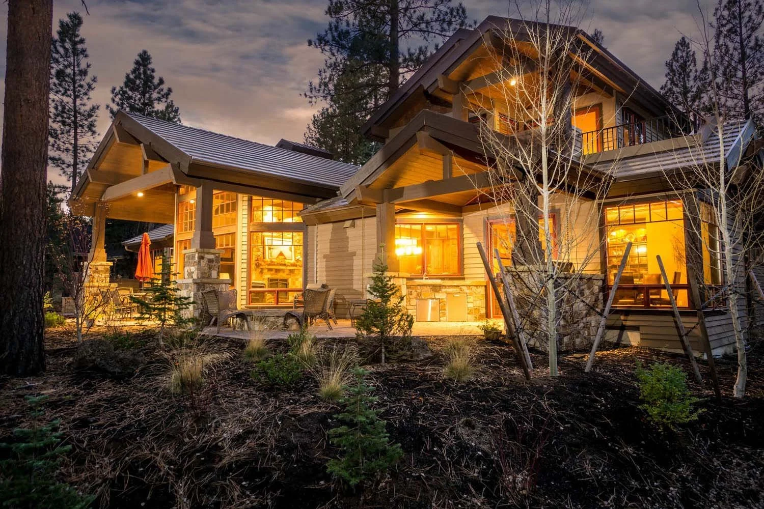 Experience the warmth of an award-winning home! This stunning mountain modern exterior from the Caldera Springs - Fireglass Loop home, designed by Spencer Williams, won "Best of Show" and "Best Architectural Design." The perfect blend of dramatic arc