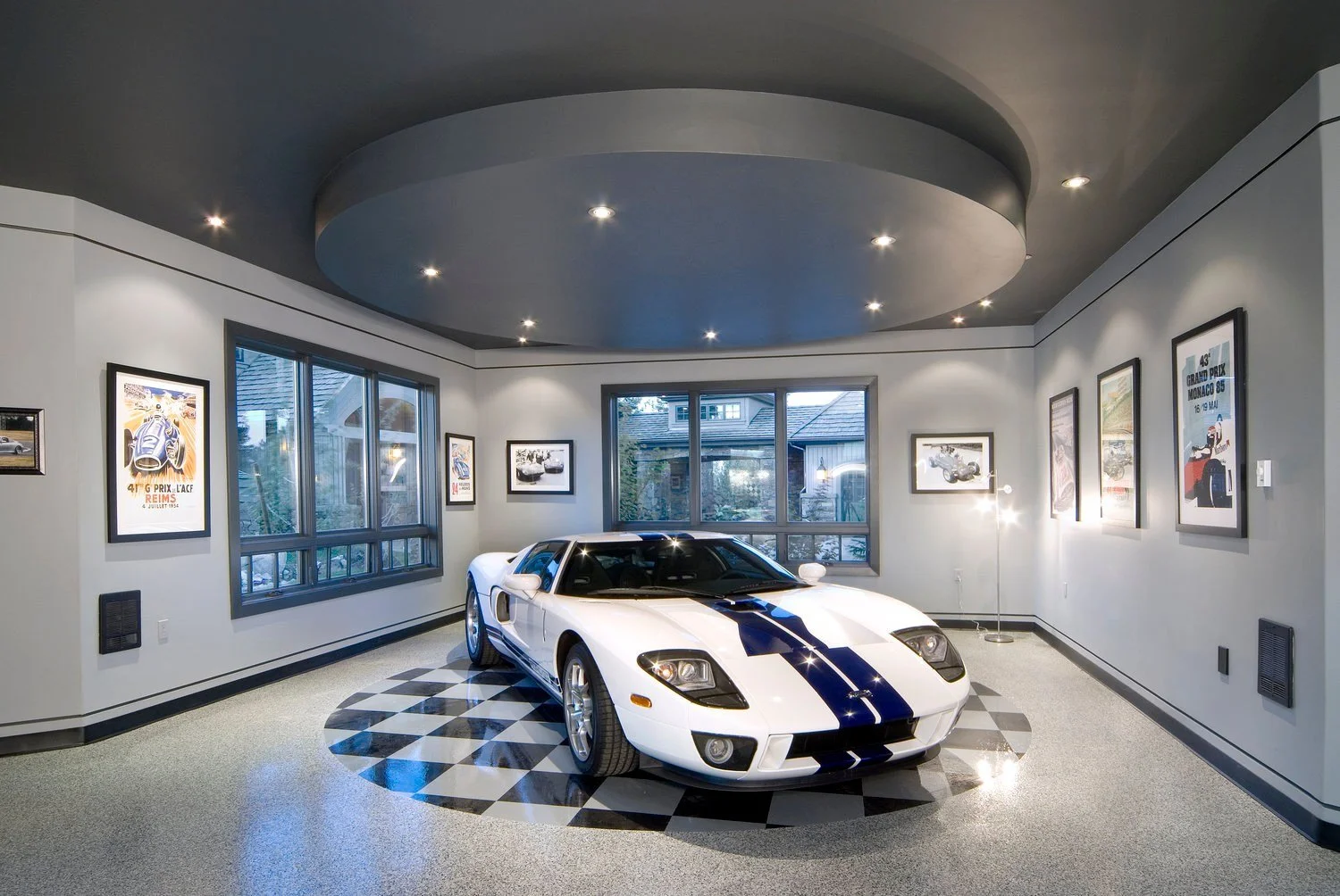 Ever thought about turning a section of your shop into a personal car showroom? We can do that—and make it look incredible. This custom project was all about creating the perfect space to highlight a dream car, right where it gets worked on. Wh