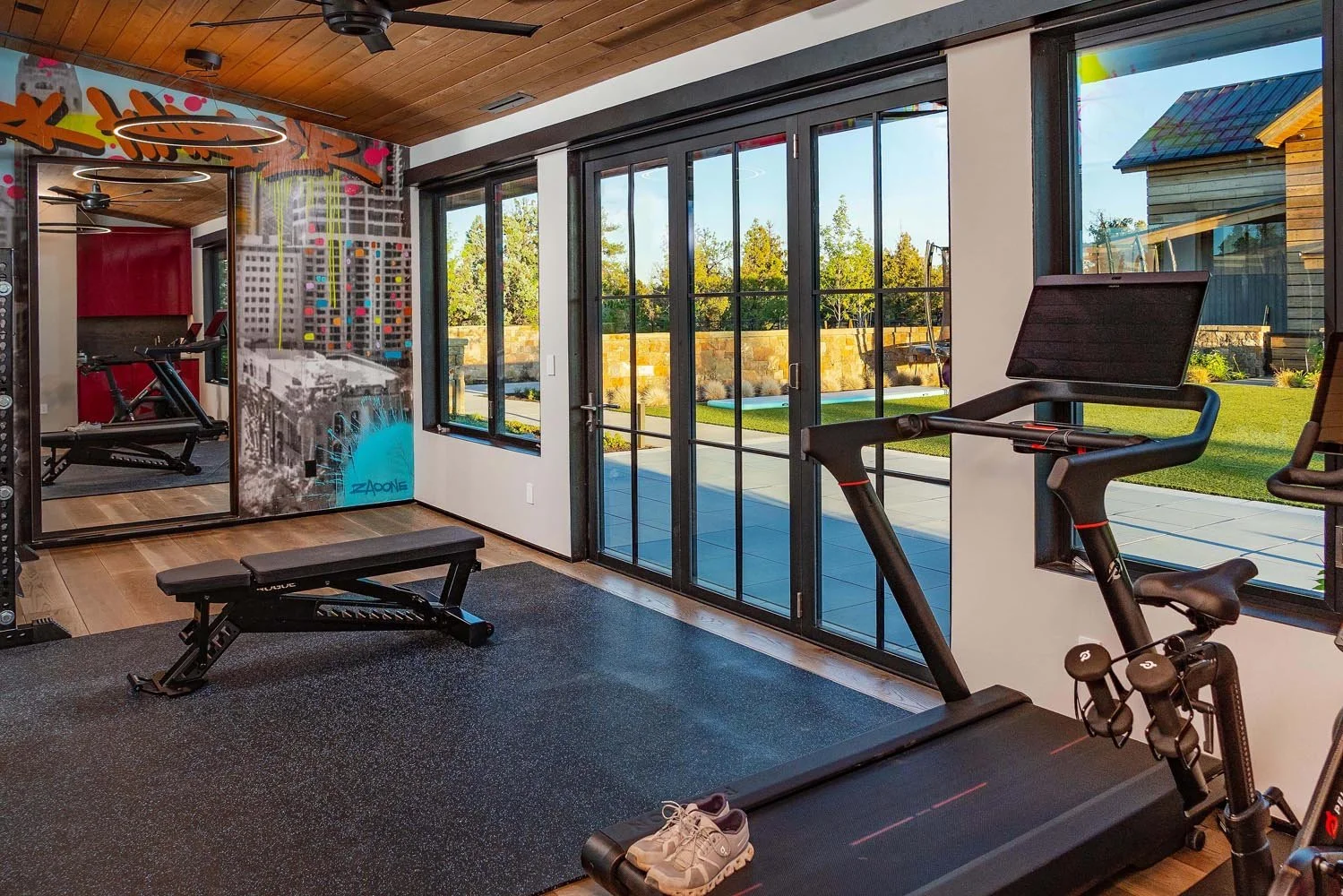 This state-of-the-art home gym is a perfect example of the customized amenities at the Pacific Cascade Heights home. Designed by Pacwest Builders with a focus on wellness and convenience, the space's mountain modern design is a testament to the maste