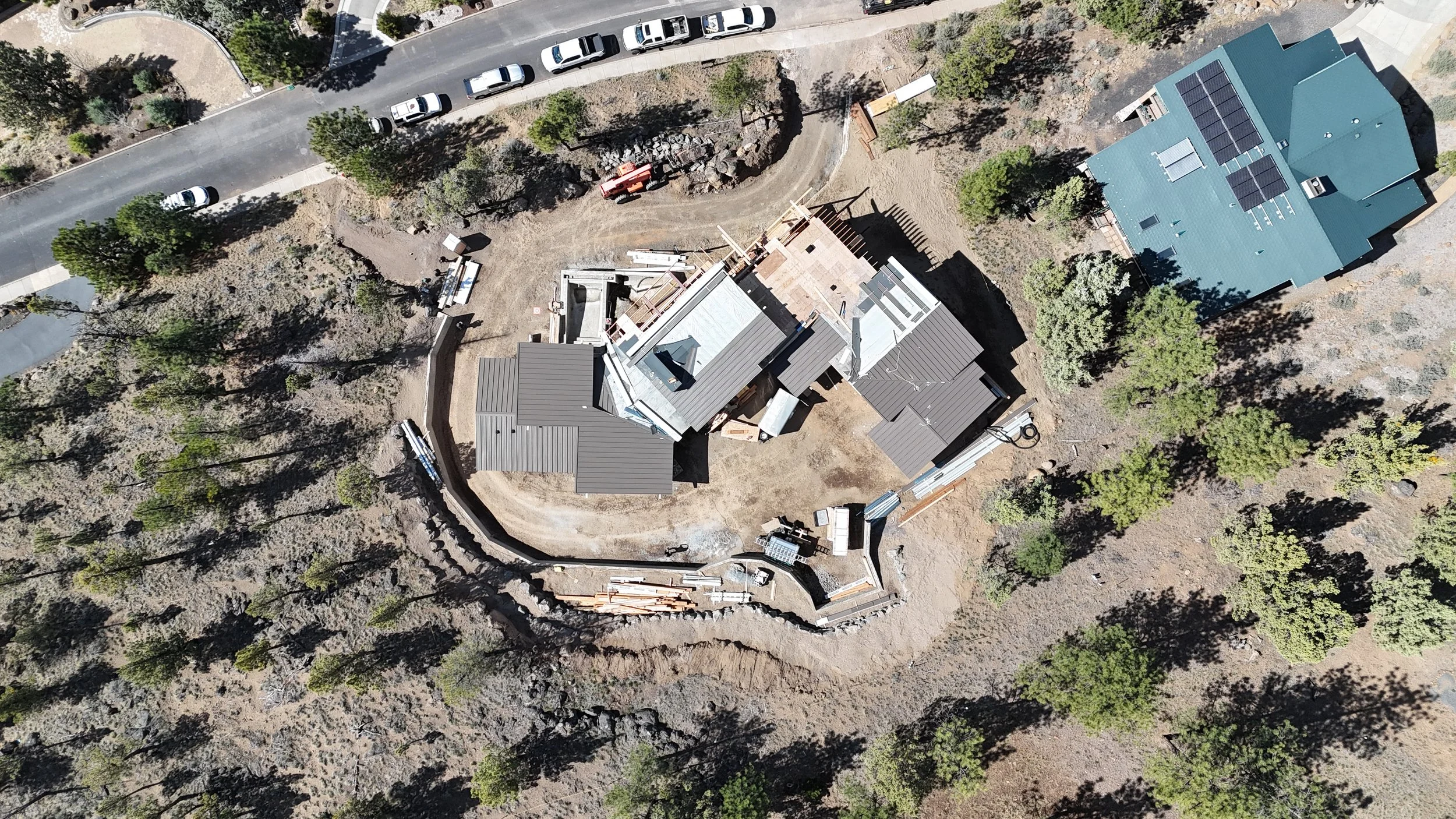 Check out this aerial view of our active custom build on Awbrey Butte in Bend. Designed by Spencer Williams and built by Pacwest Builders.