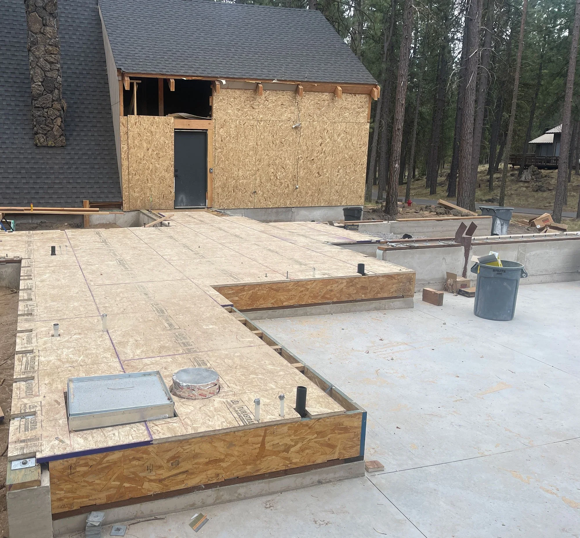 Black Butte Ranch in Central Oregon is full of 1970s cabins in a wide range of conditions. Out clients came to us with one that was well designed, well built, and was in great shape for its age. That said, it had no Garage, inadequate insulation, an