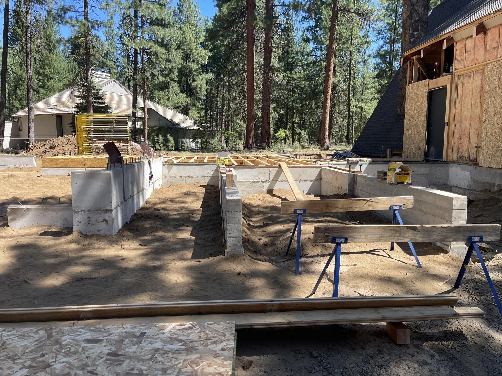 Black Butte Ranch in Central Oregon is full of 1970s cabins in a wide range of conditions. Out clients came to us with one that was well designed, well built, and was in great shape for its age. That said, it had no Garage, inadequate insulation, an