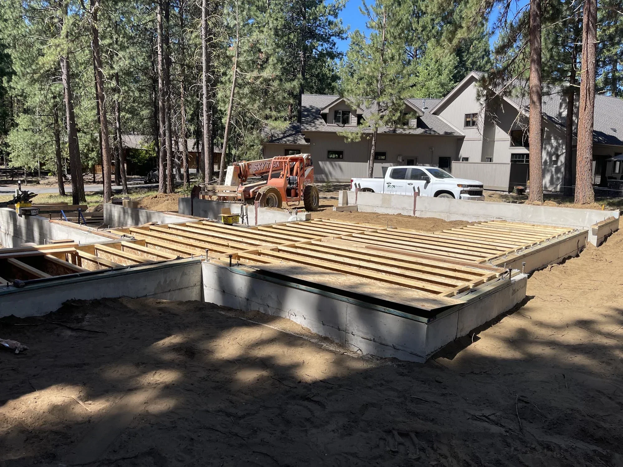 Black Butte Ranch in Central Oregon is full of 1970s cabins in a wide range of conditions. Out clients came to us with one that was well designed, well built, and was in great shape for its age. That said, it had no Garage, inadequate insulation, an