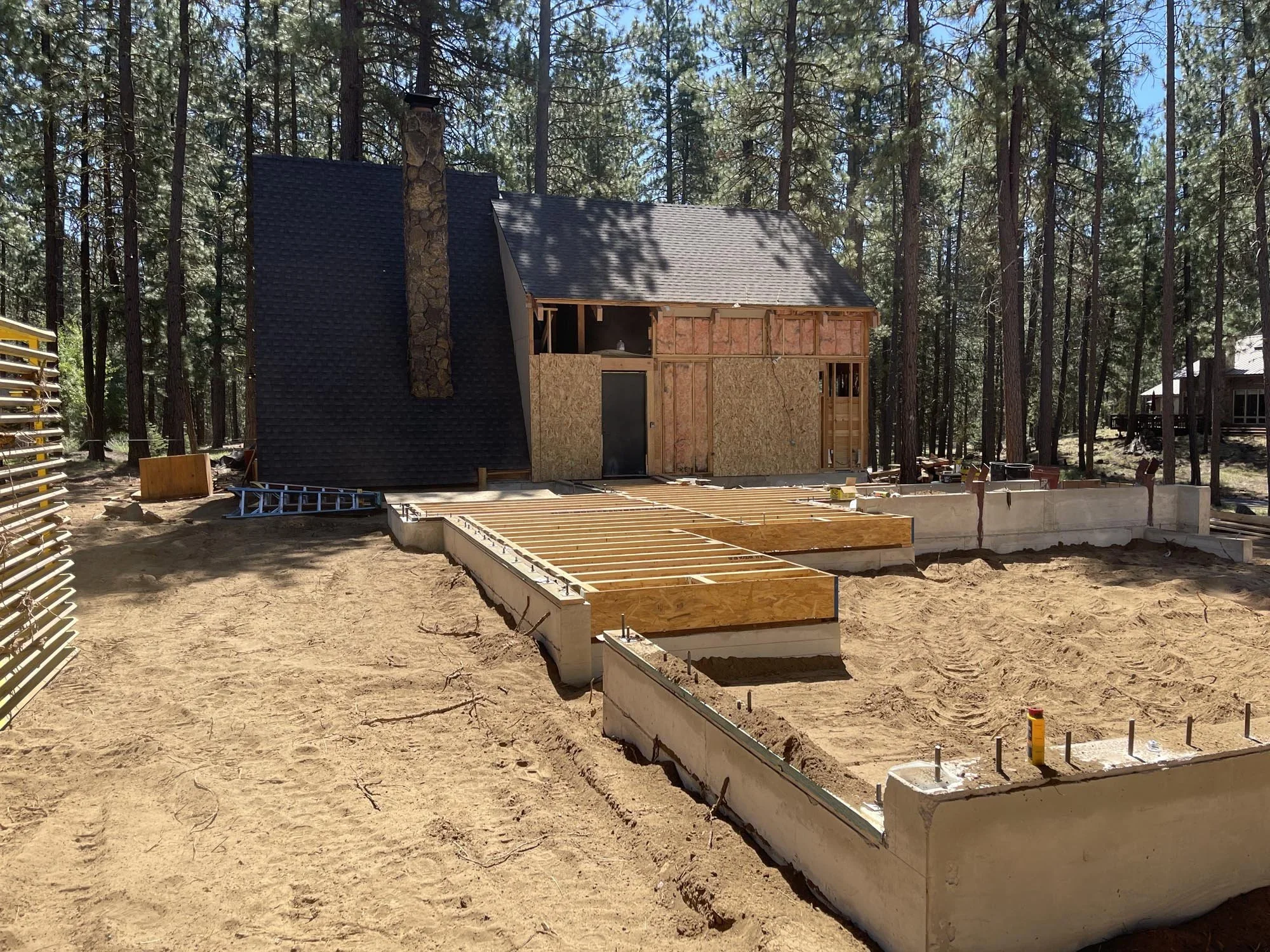 Black Butte Ranch in Central Oregon is full of 1970s cabins in a wide range of conditions. Out clients came to us with one that was well designed, well built, and was in great shape for its age. That said, it had no Garage, inadequate insulation, an