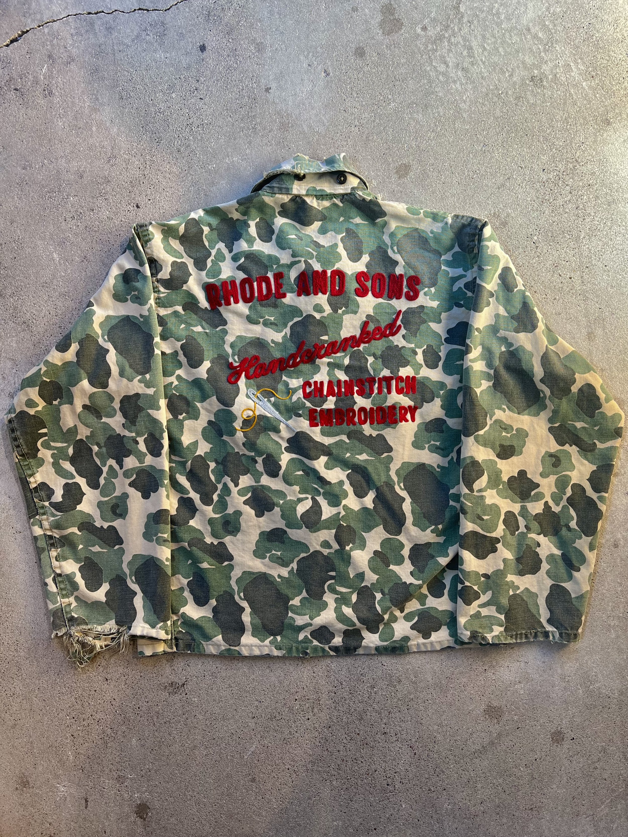 Custom embroidery stitched onto a vintage hunting jacket using an antique hand cranked chainstitch machine from the 1950s. Graphic was designed and pitched by Rhode and Sons a local chainstitch embroidery shop based in DFW Texas.