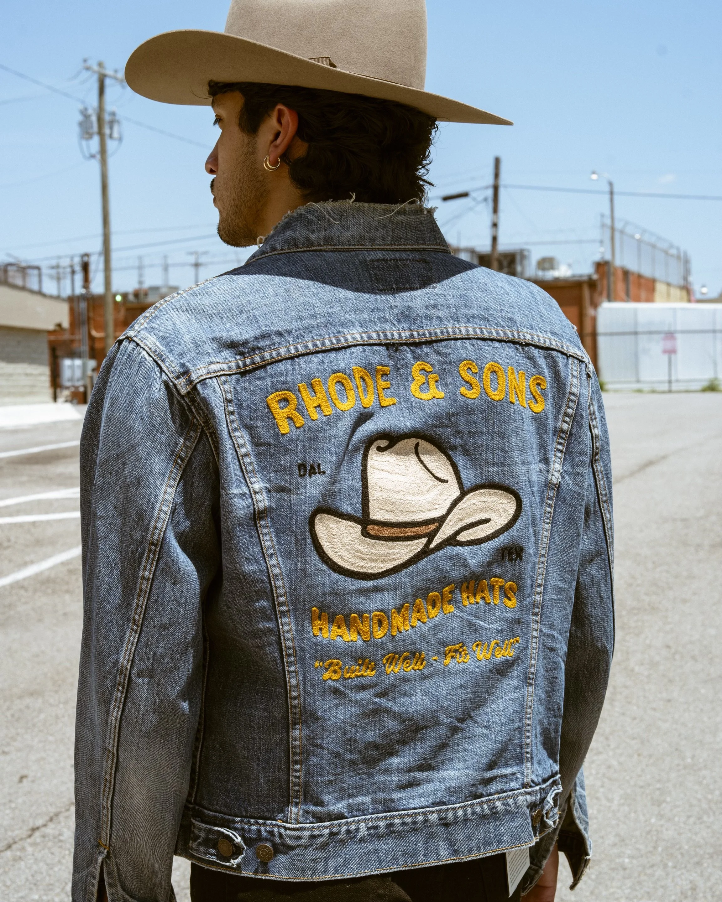 Custom small business marketing chainsititched embroidered jacket, made using a vintage hand cranked Cornely machine. Made in Dallas Texas by a chainstitches who offers live on site chainstitch activations for brands.