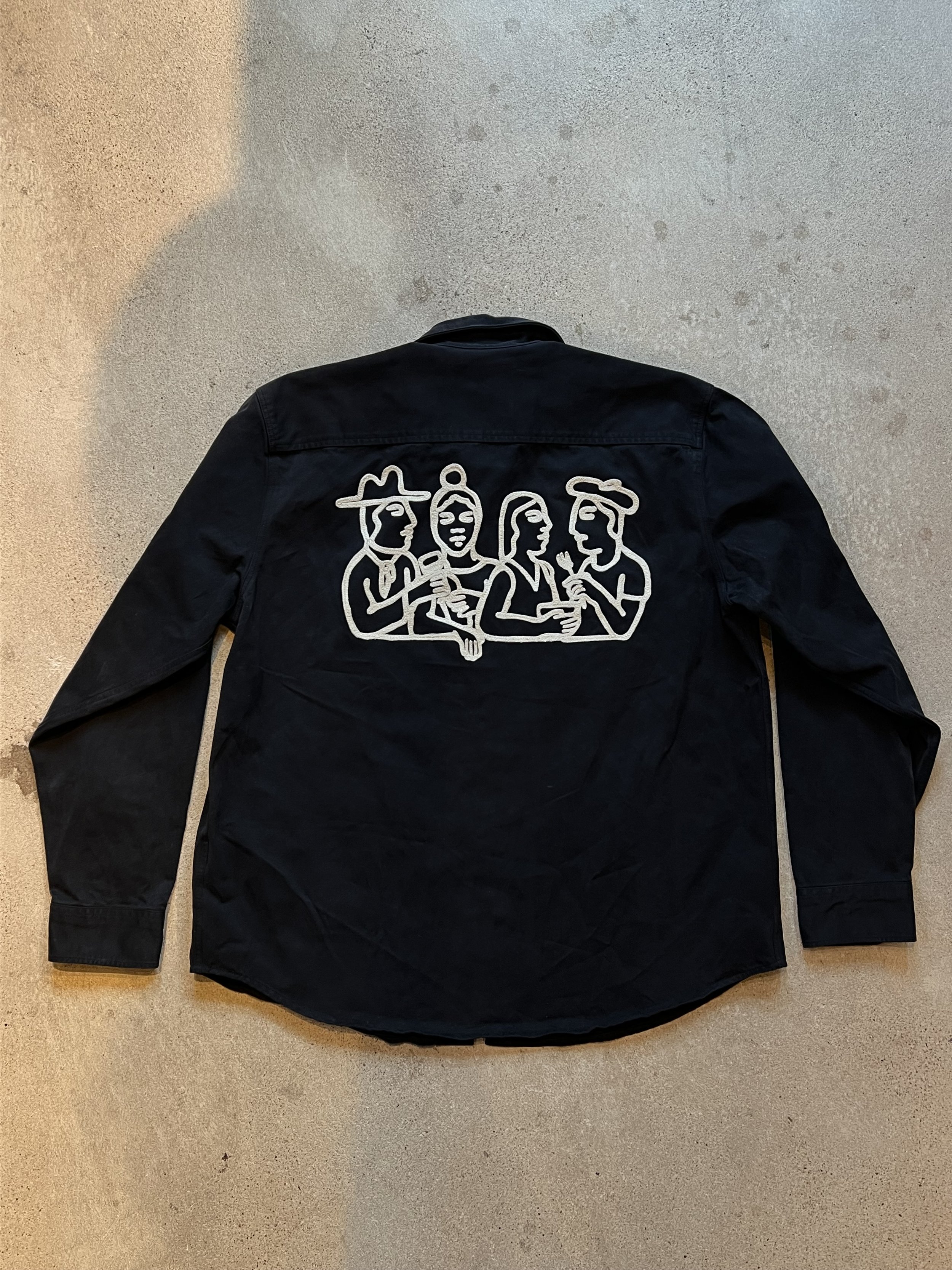 Custom embroidered work shirt for local Dallas photographer Sobremesa Studios. Chainstitched onto a canvas button down shirt using cotton thread. Work done by Rhode and Sons a Texas based chainstitch embroidery shop.