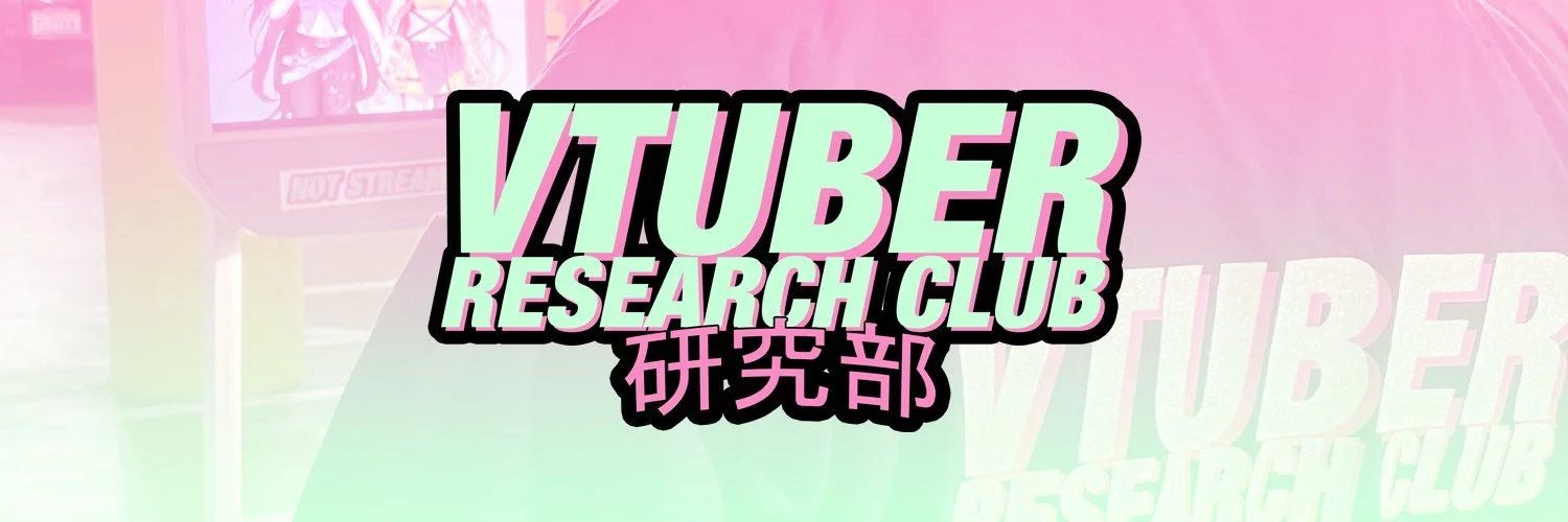 Graphic with pastel colors and bold text reading "Vtuber Research Club" and Japanese characters, with a background of a screen showing animated characters.