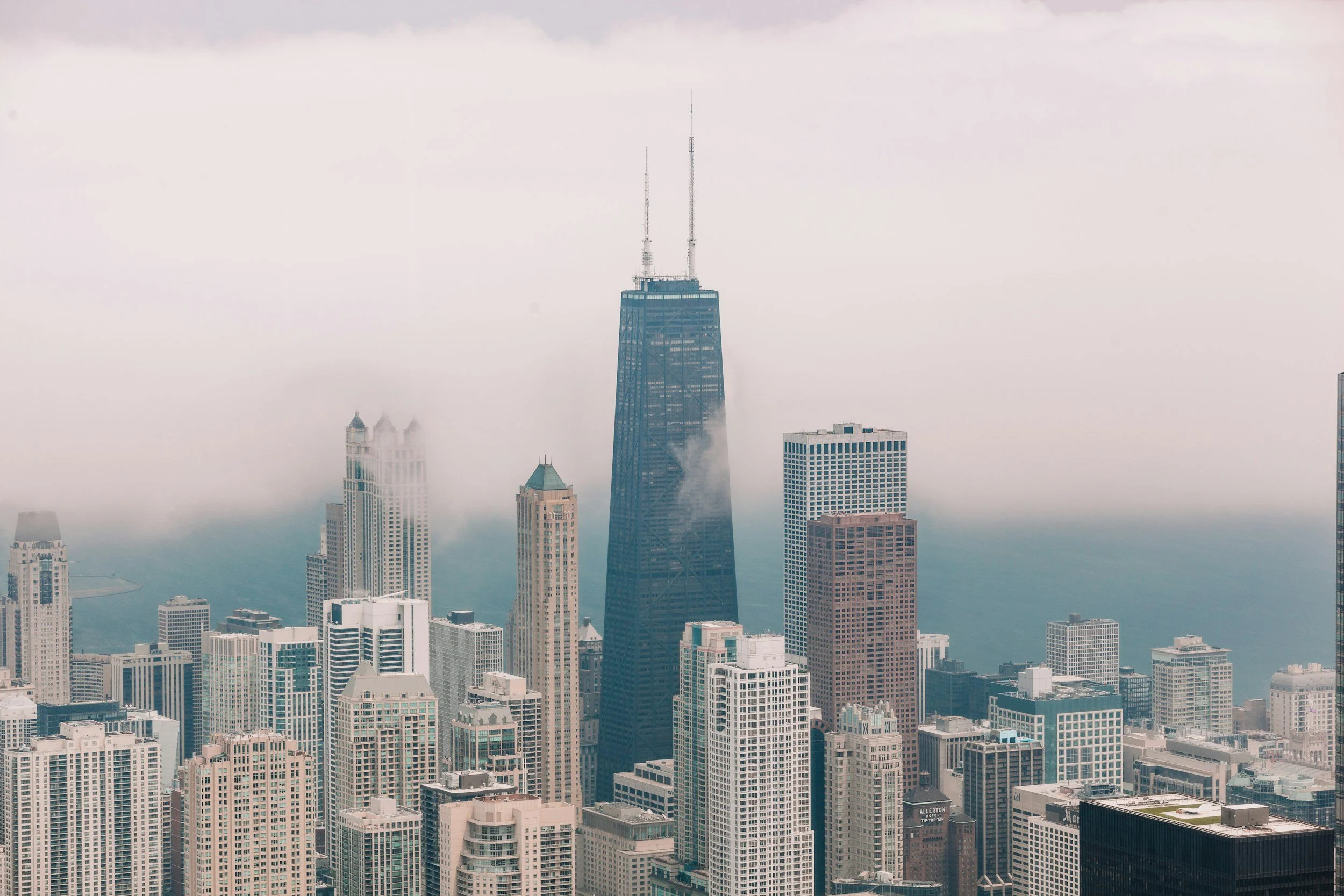 Skyline of downtown Chicago with the John Hancock Center and Lake Michigan in the background, foggy weather