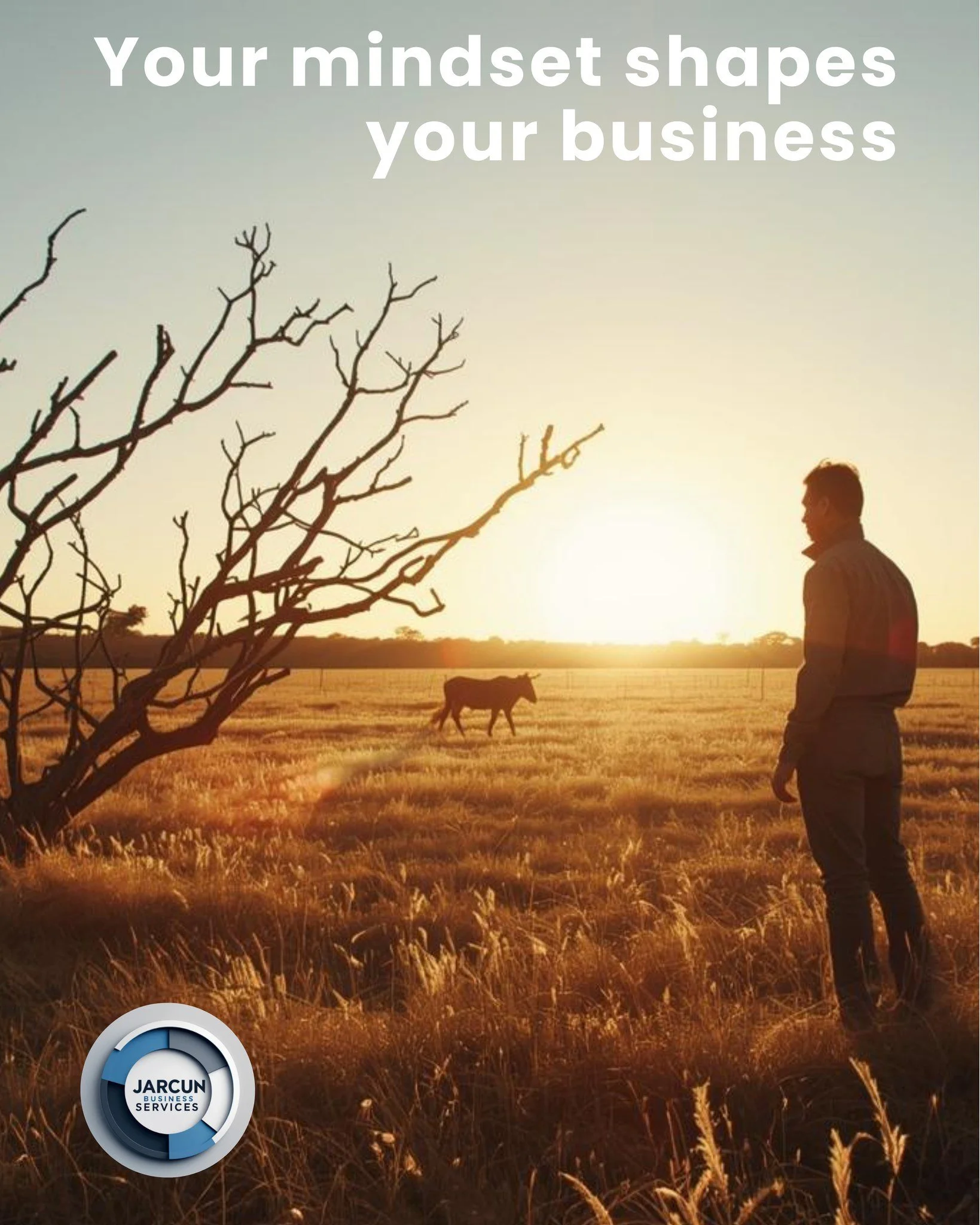Man standing in a field at sunset, looking at a cow, with a leafless tree in the foreground and the text "Your mindset shapes your business" at the top.