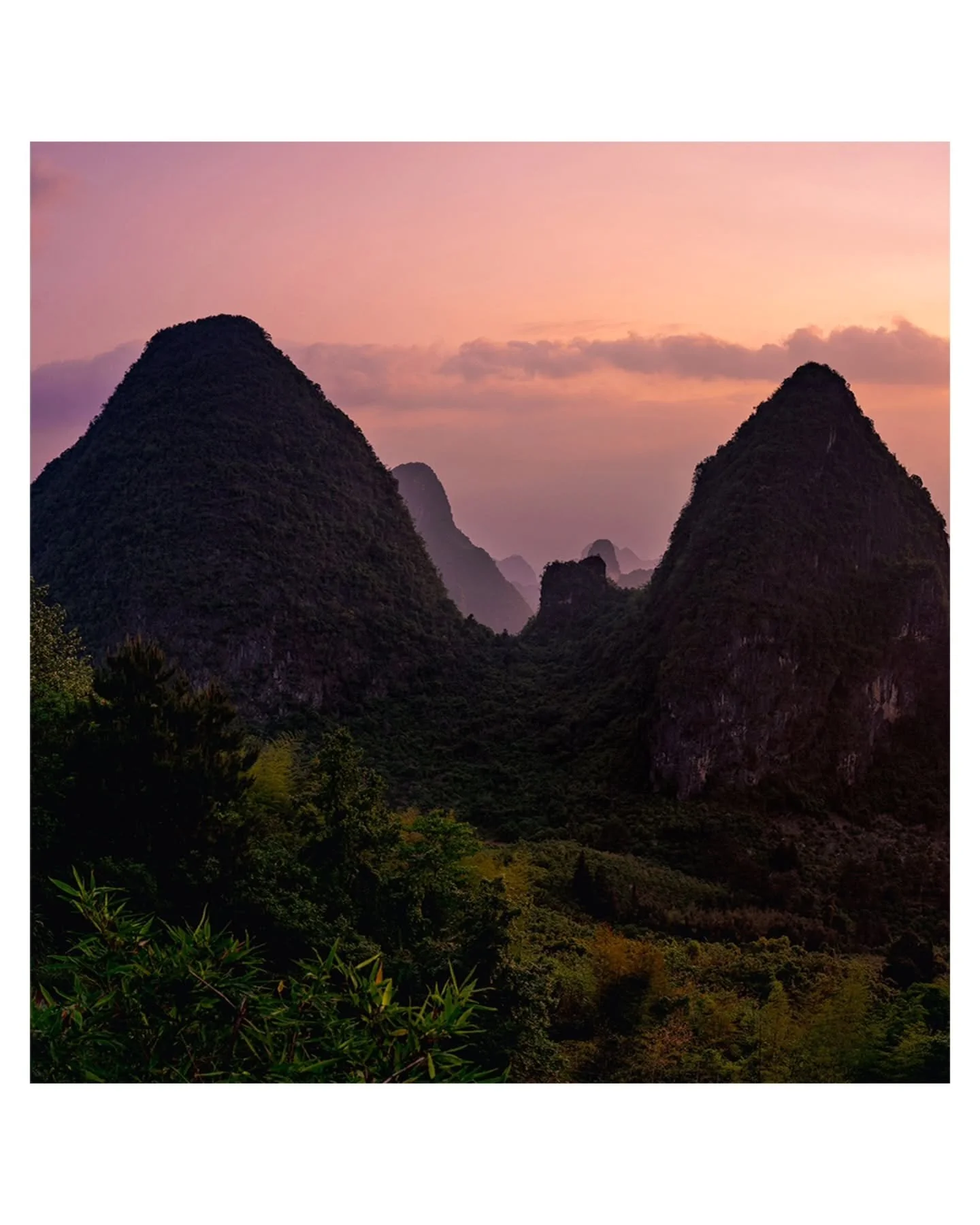 Part 1 of 3 &ndash; Icon: The Village, Guilin

Captured at sunrise in Guilin, the hidden village rests quietly among the karst mountains as light breaks through the clouds. A single beam illuminates the valley, revealing stillness beneath layers of m