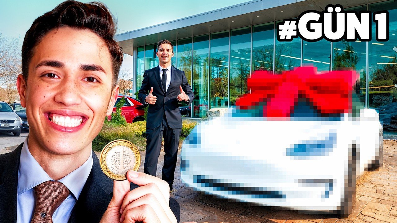 A young man in a suit holding a coin smiling and showing a thumbs up, standing in front of a dealership with a pixelated car decorated with a red bow and another man in a suit giving a thumbs up. The text '#GÜN1' is in the top right corner.