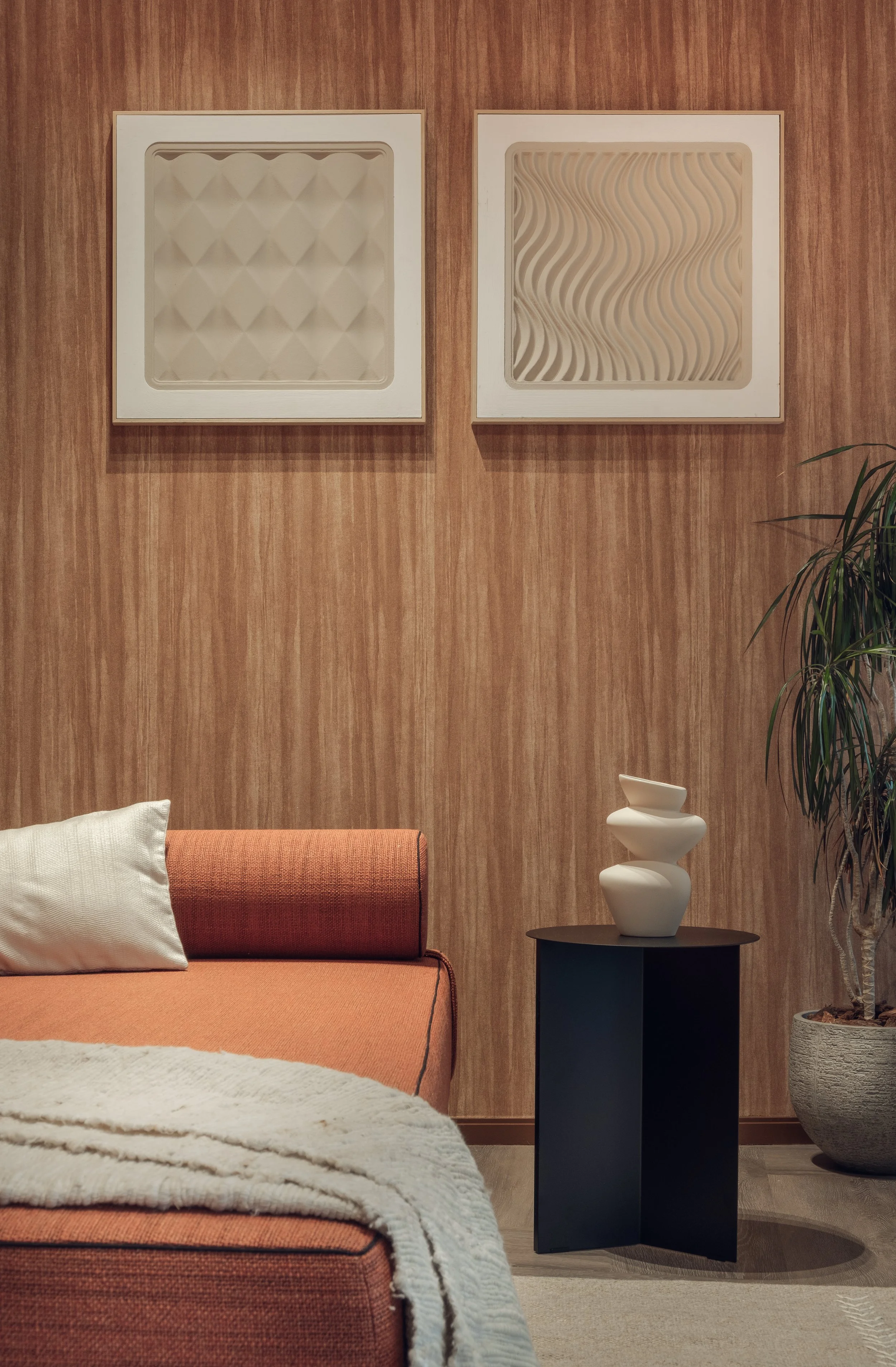 Lounge seating area with wood wall panels at the White and Case office in Tornado Tower Doha interior architecture photography