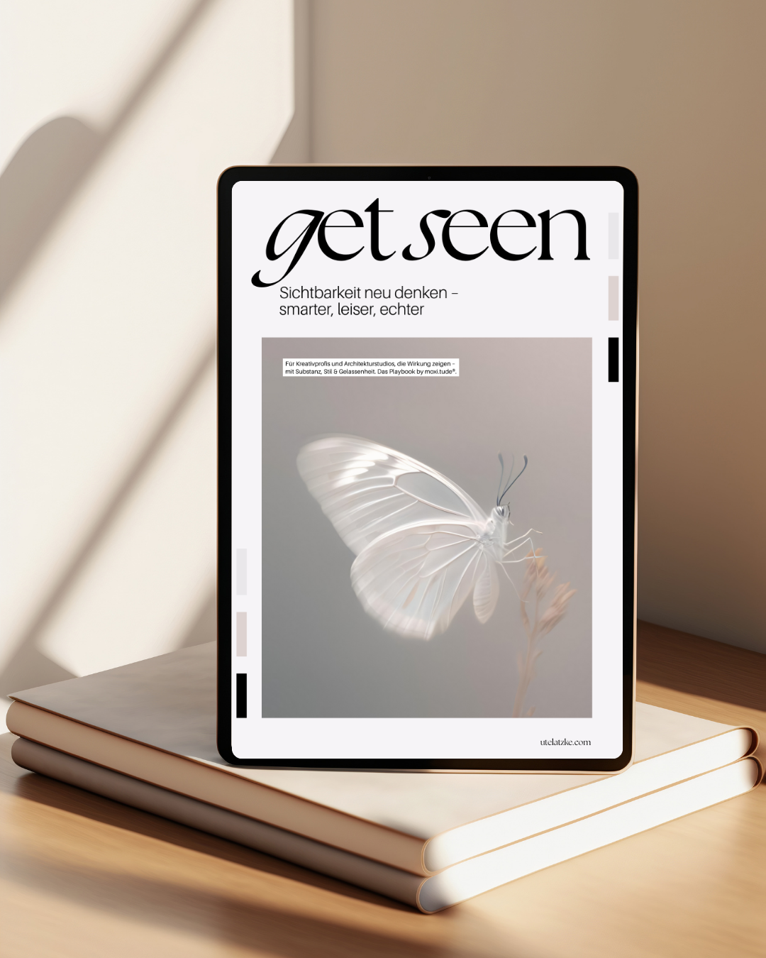 iPad mit Cove und Schmetterling drauf