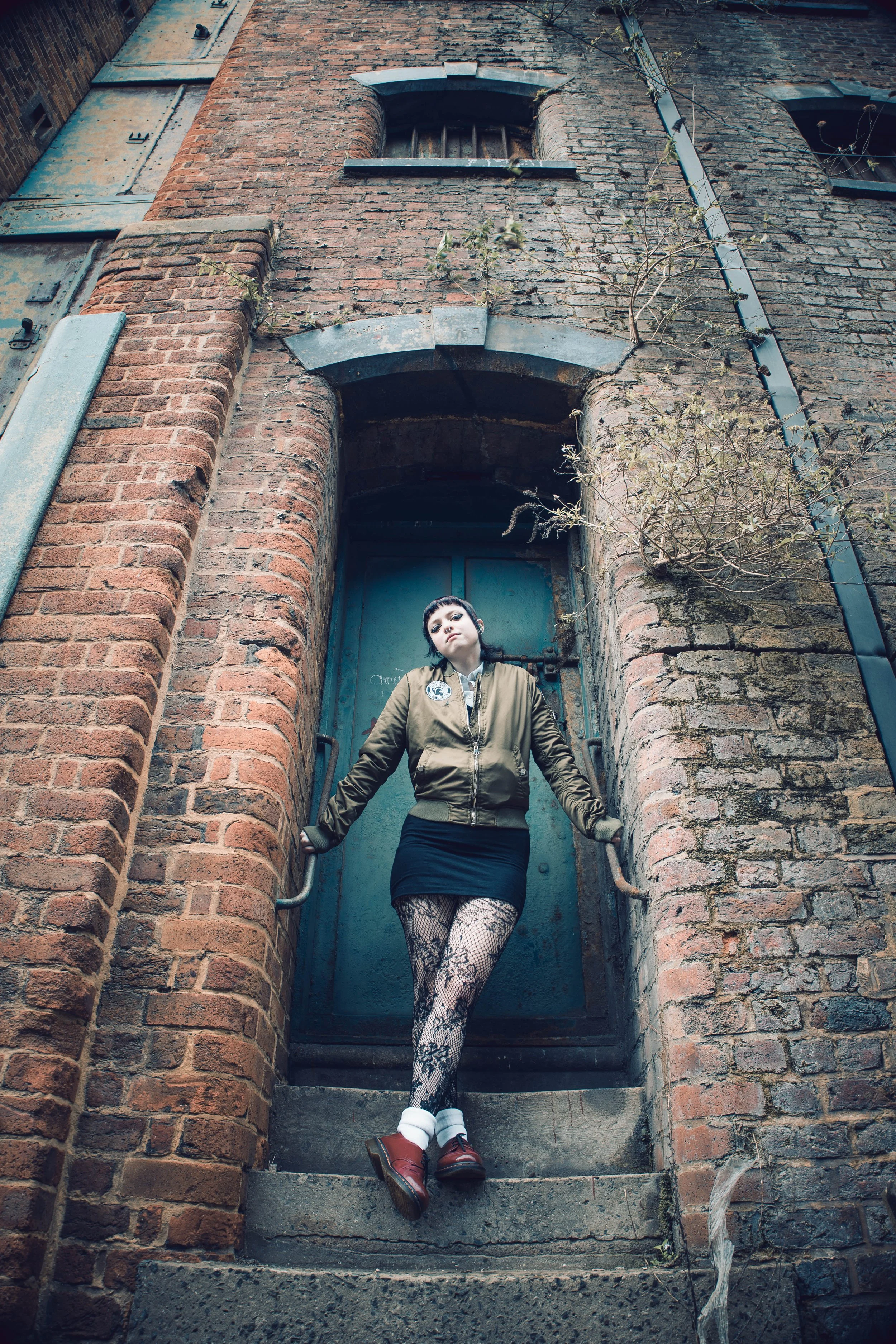 this is Rebbecca a skinhead girl from Liverpool, this was shot on the famous staircase in Liverpool where Bob Dylan had his photo taken.