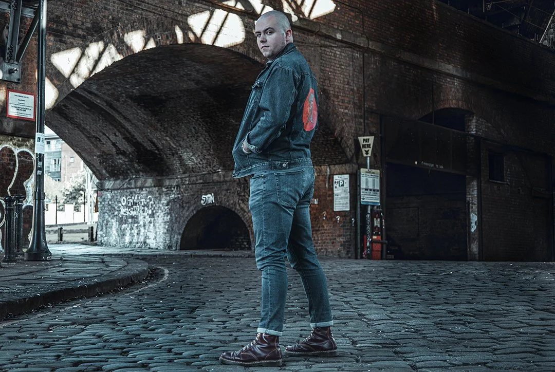 T.J a tradictional skinhead wearing the trojan logo