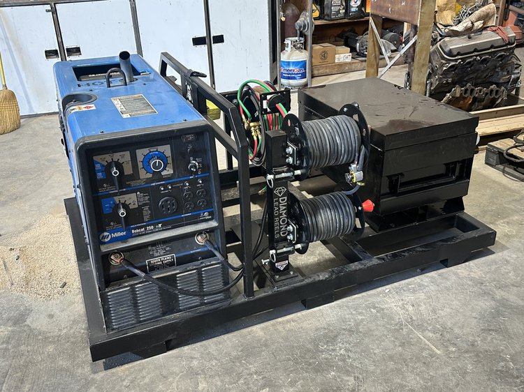 Pro welding skid with toolbox and torch reel in a truck bed