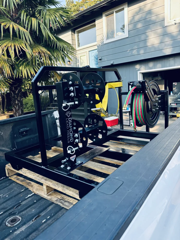Lite truck bed welding skid with lead reels by Elite Fab Works