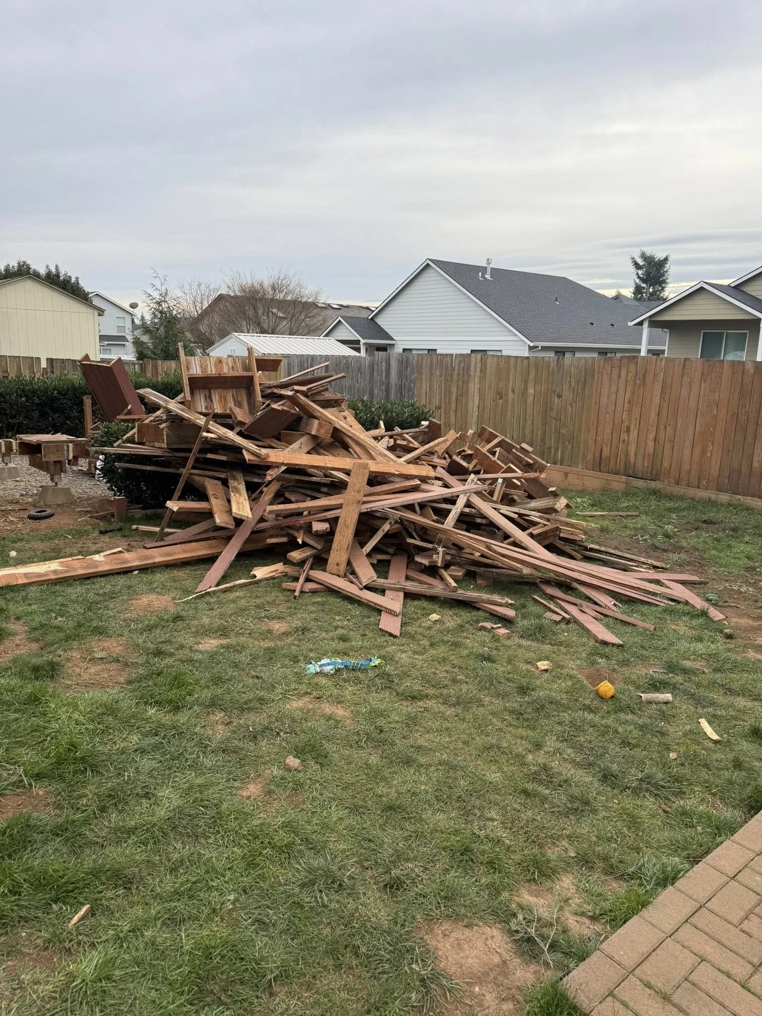 Construction debris clean up from deck demolition Oregon City, OR.