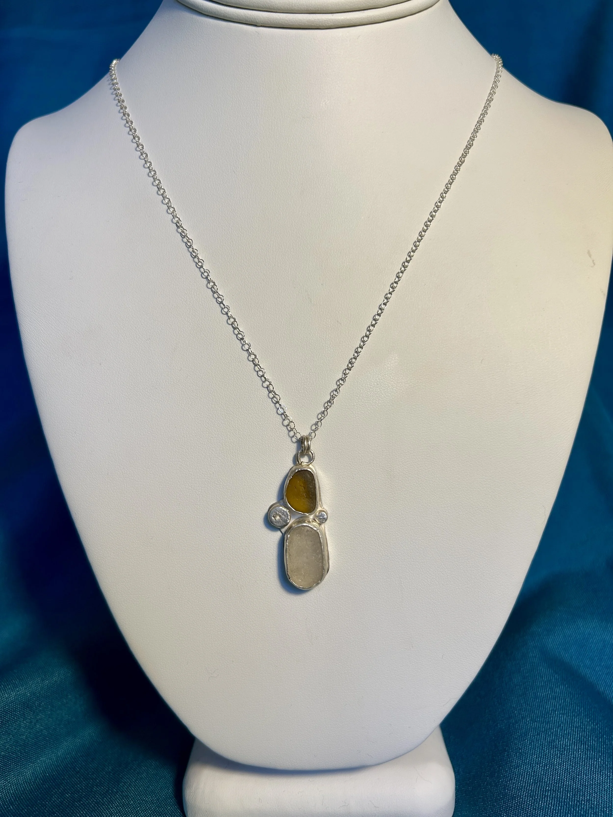 Amber and clear pendant
