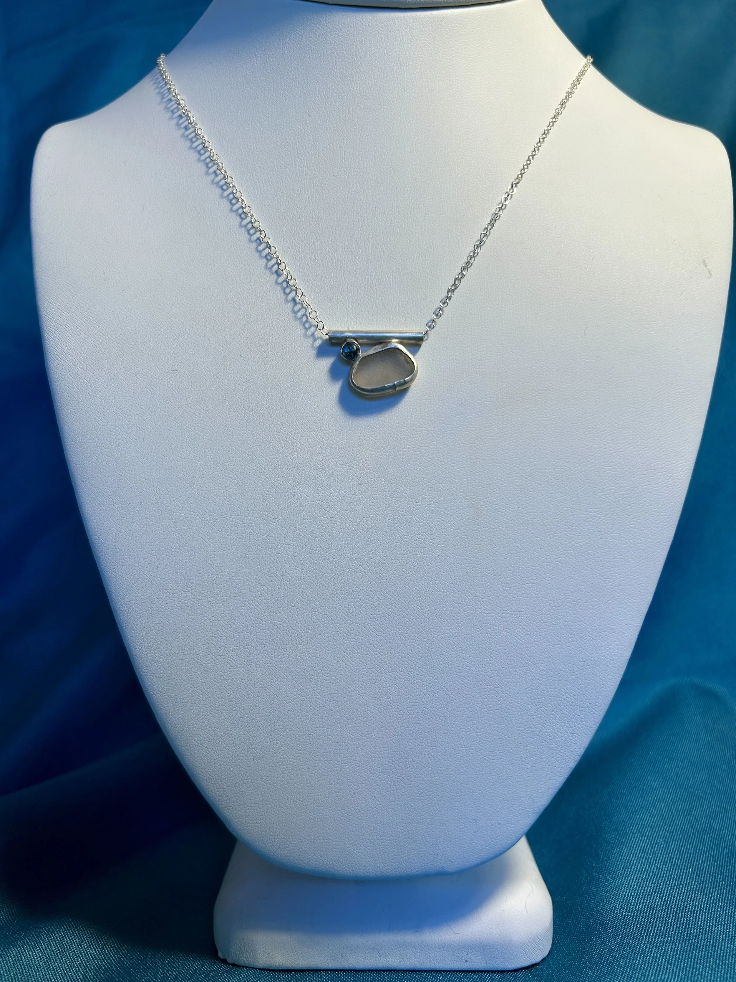 Clear and aquamarine pendant