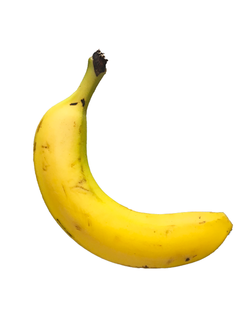 A yellow banana with some brown spots and a brown top, placed on a surface.