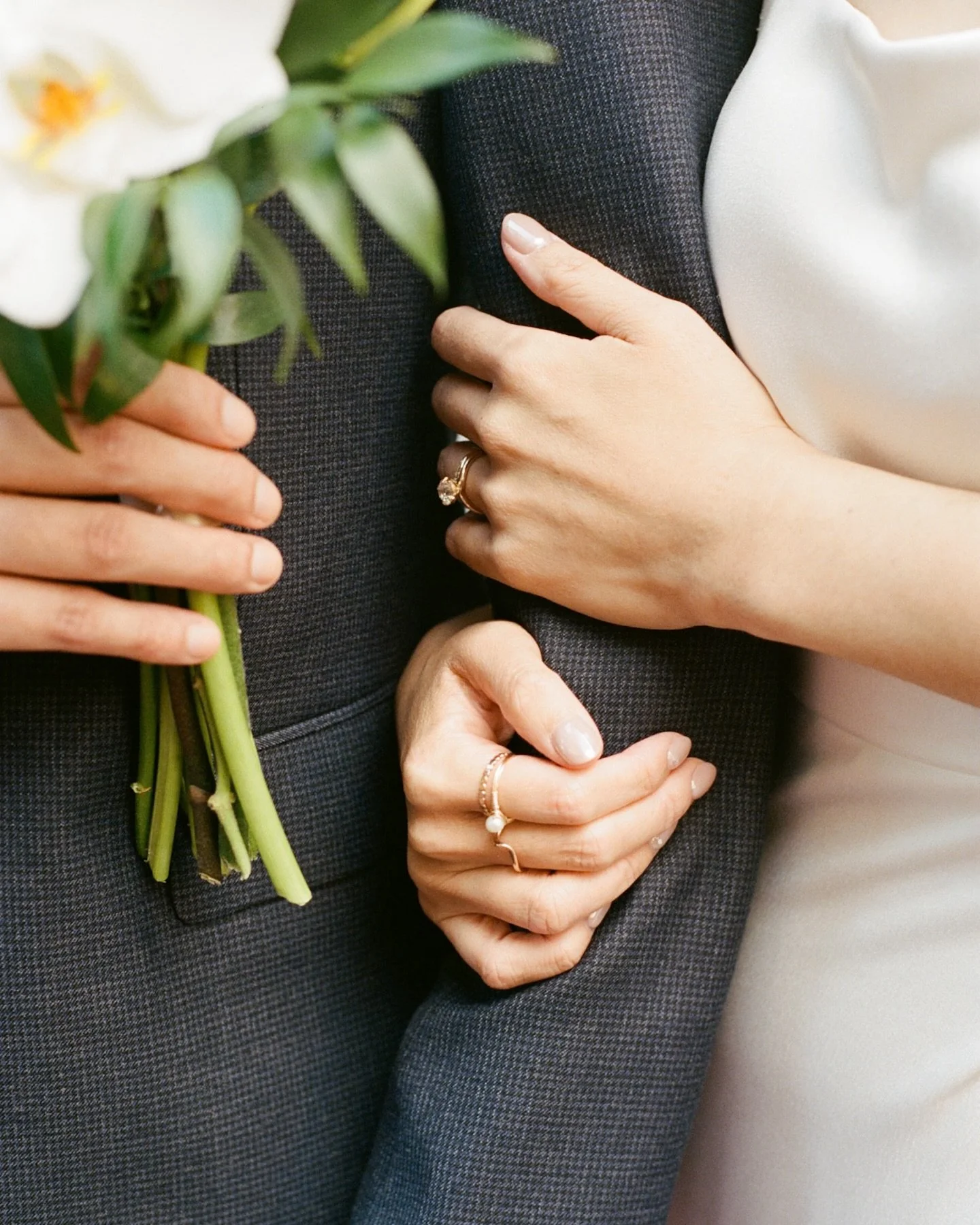 Details from Aimee + Hao's city hall wedding last month, taken in digital + film

Photog : @audreytjahjono 
Makeup Artist : @kbeautystudionyc 
Wedding gown : @jennyyoonyc 
Tuxedo : @theory__ 
Wedding rings : @kenanddanadesign 
Florals : @scottsflower
