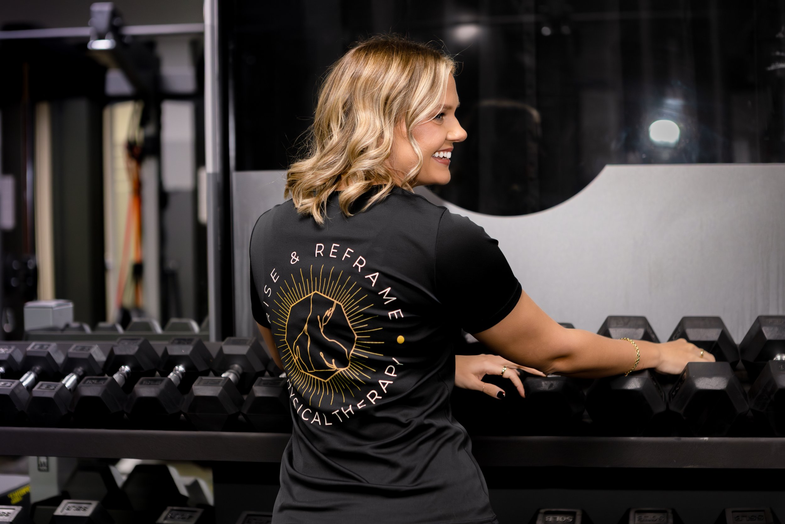 Dr. BettyLou DeYoung in the Rise & Reframe Physical Therapy gym in Temecula, CA — one-on-one strength and rehabilitation training for active adults and athletes
