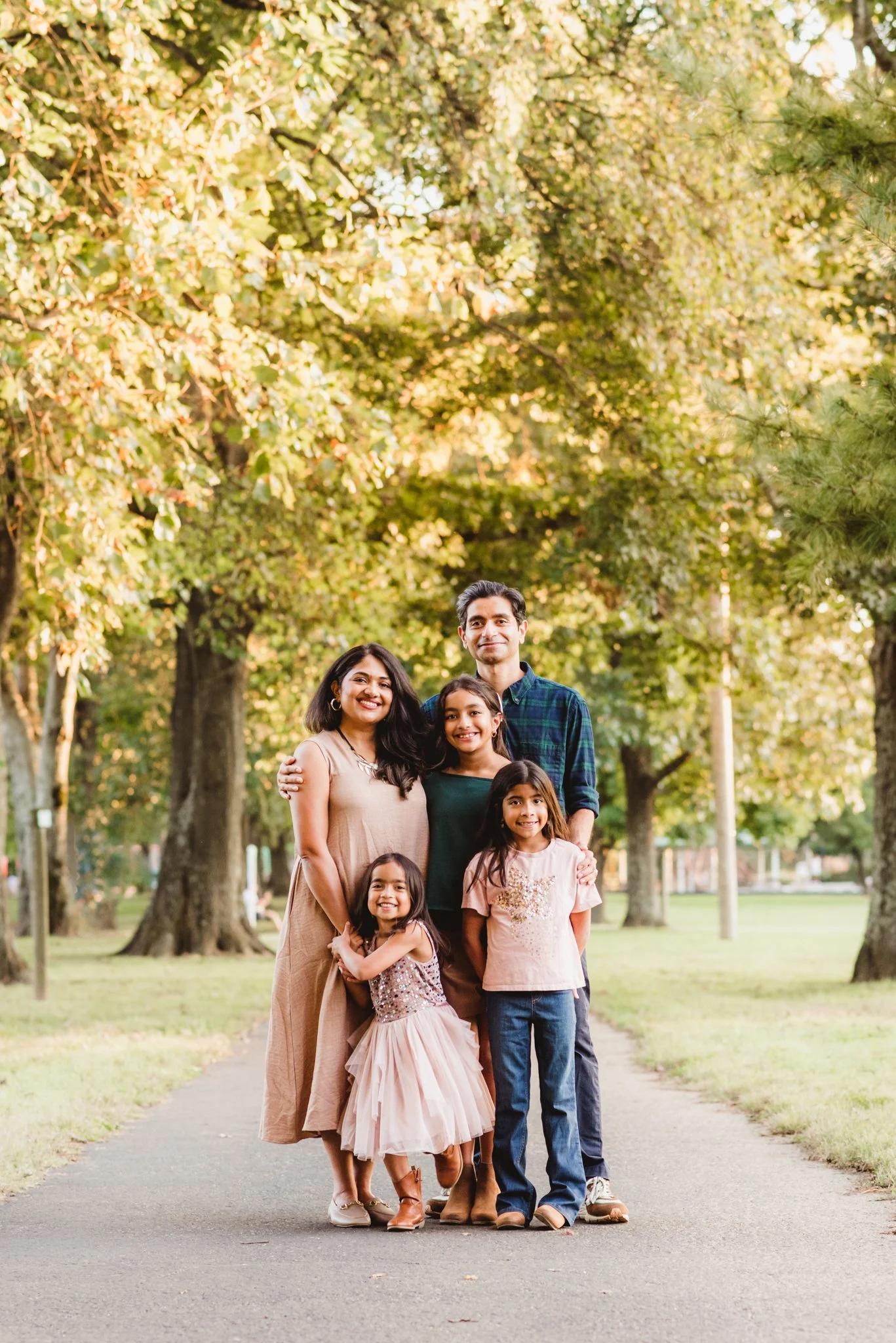 Family photographed together outdoors during a family photography session in Middle Tennessee.